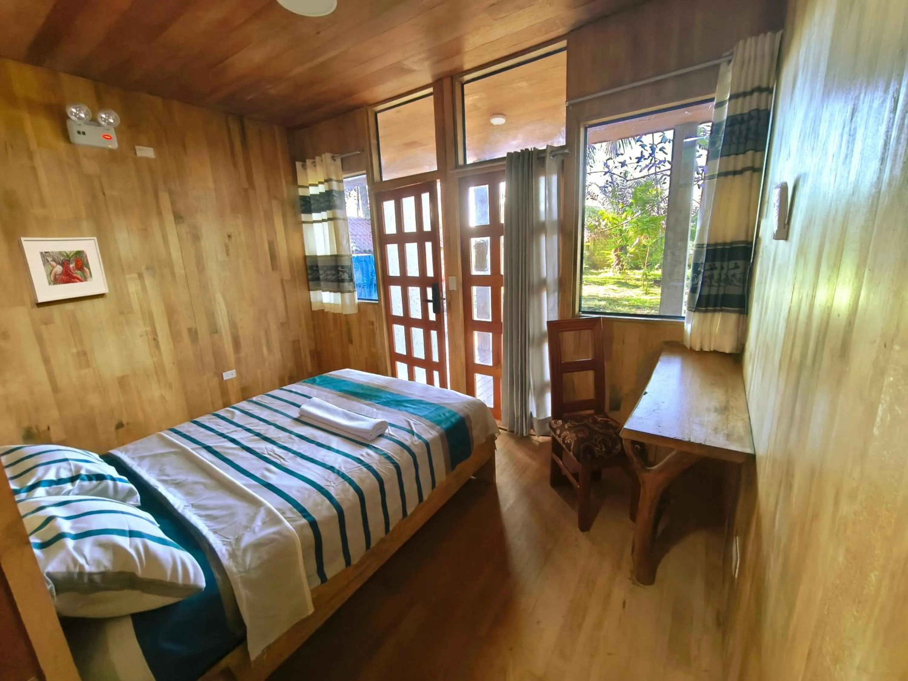 Photo of the whole room, Bed in Retazos Eco Hotel