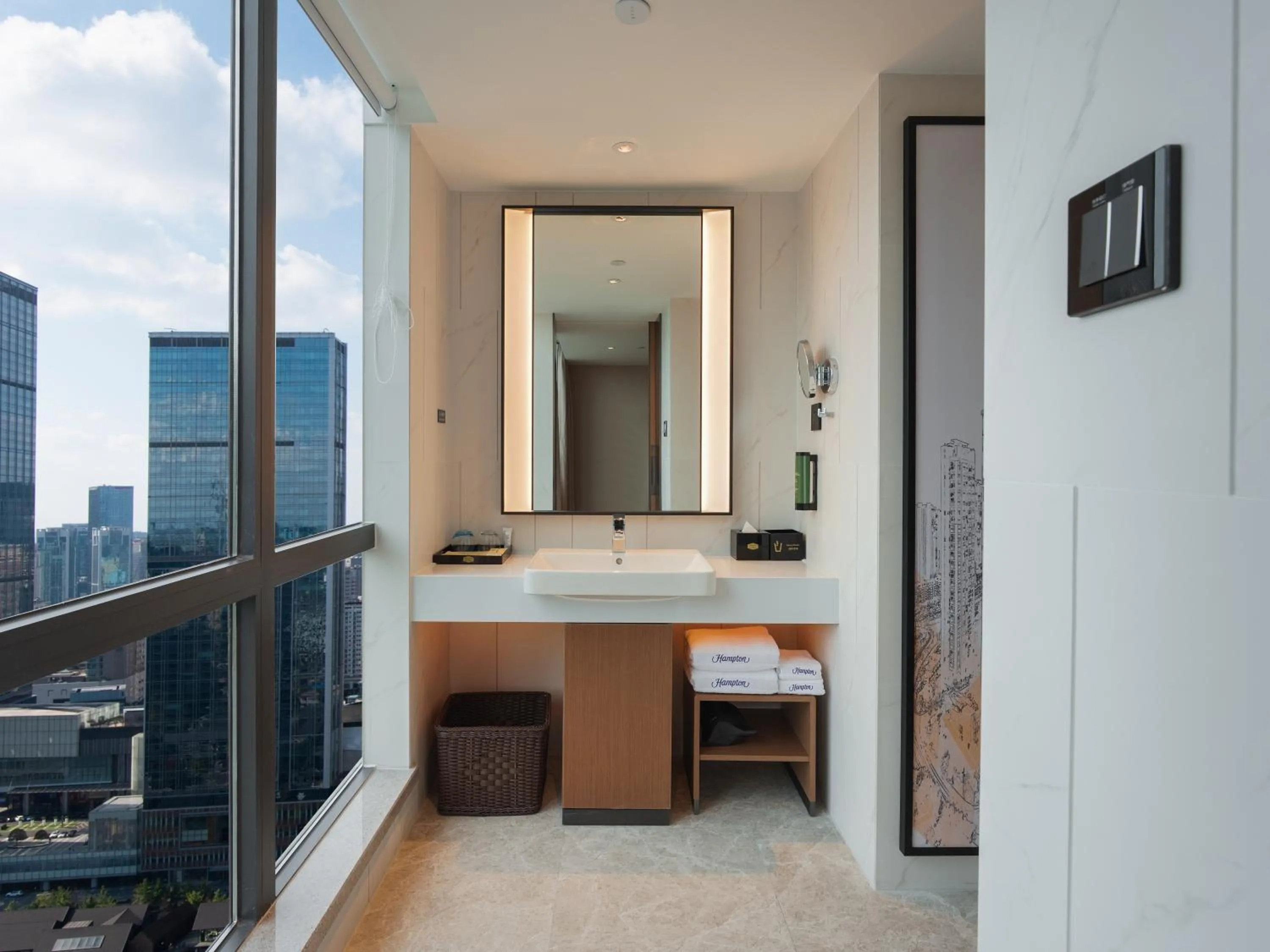 Toilet in Hampton by Hilton Dongguan Fenggang