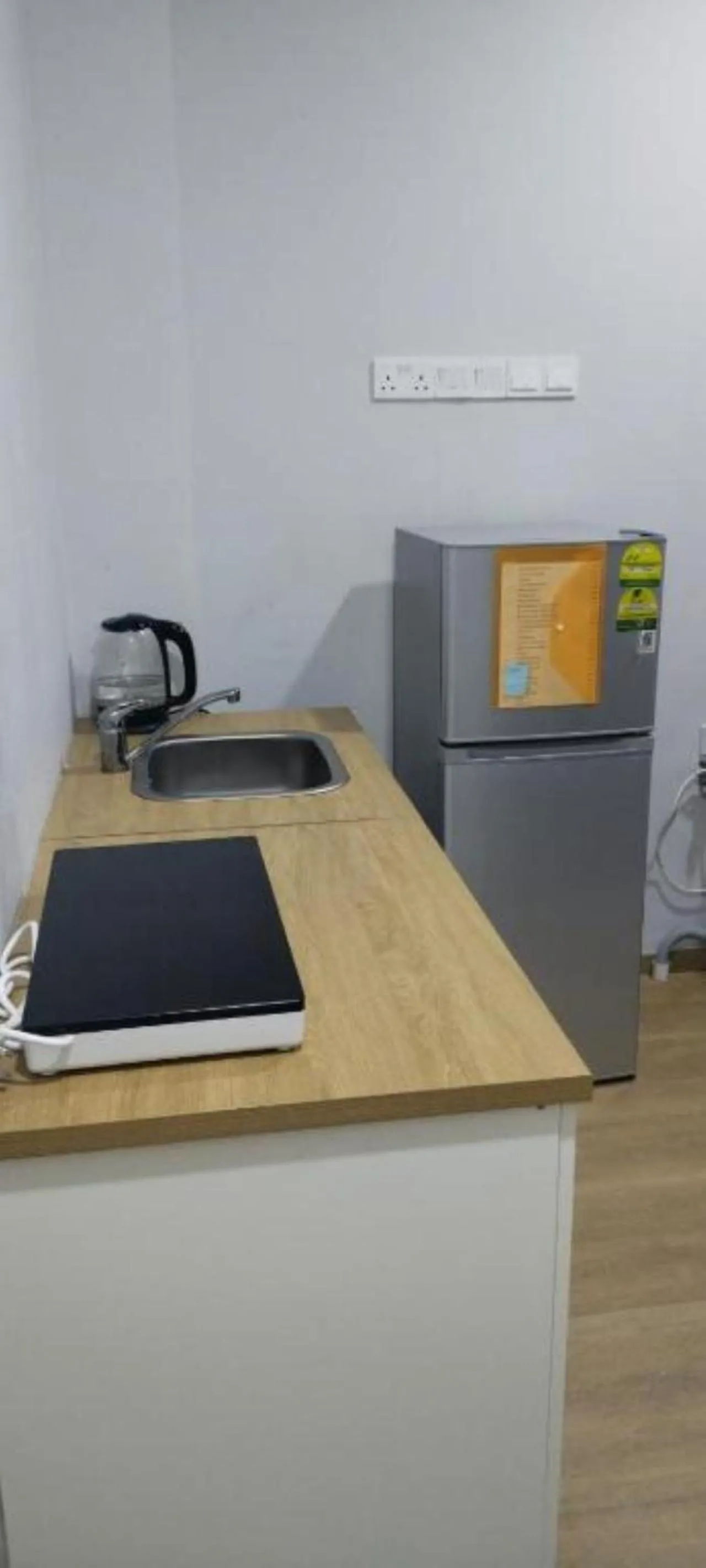 kitchen in The Family Suites Serviced Apartments