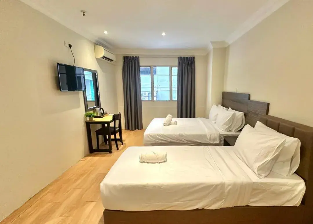 Deluxe Triple Room in Swing & Pillows - Bukit Bintang City Centre Deluxe Triple Room in Swing & Pillows - Bukit Bintang City Centre