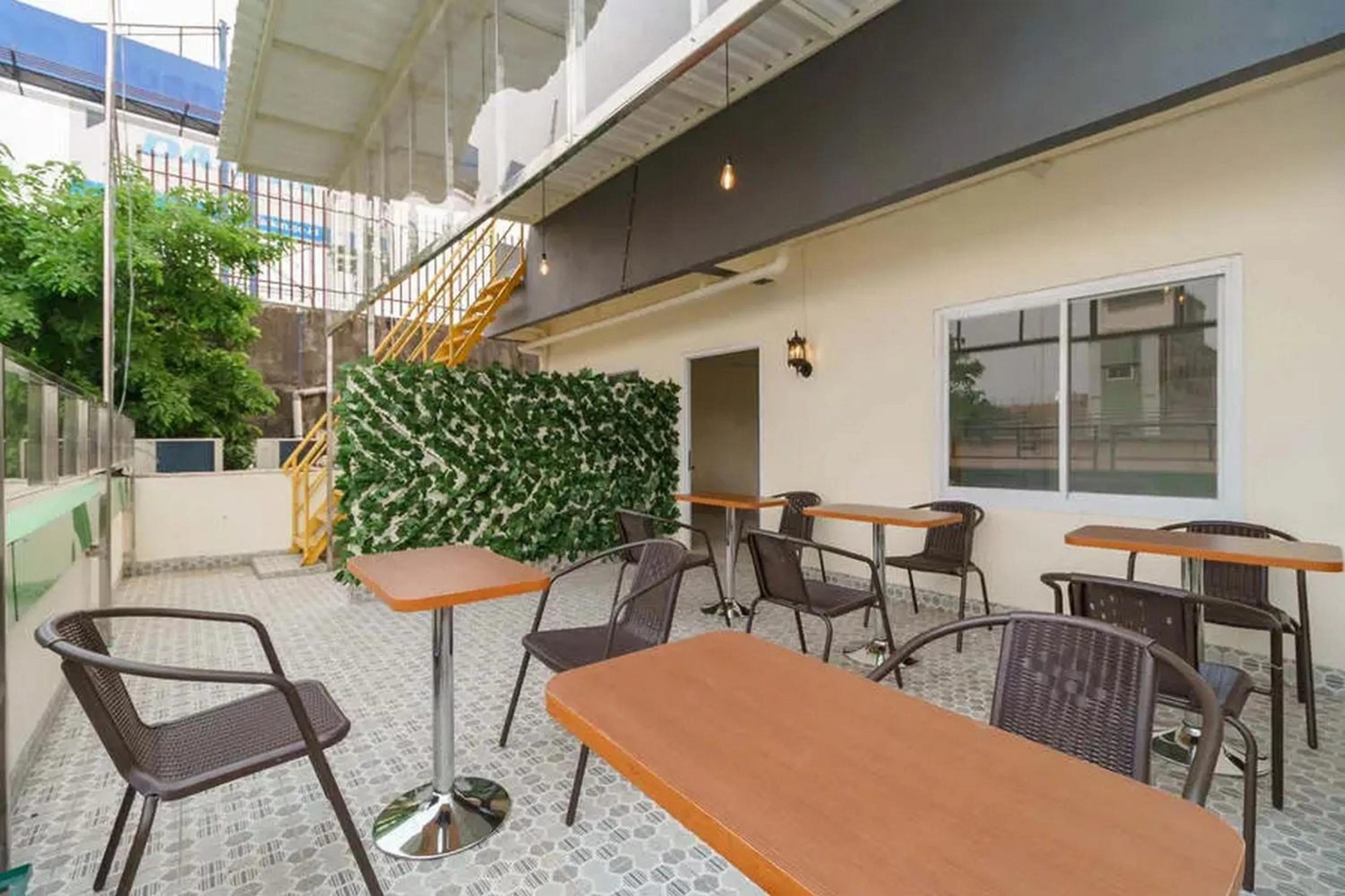 Seating area in RedDoorz Plus near RS RK Charitas 2 Palembang