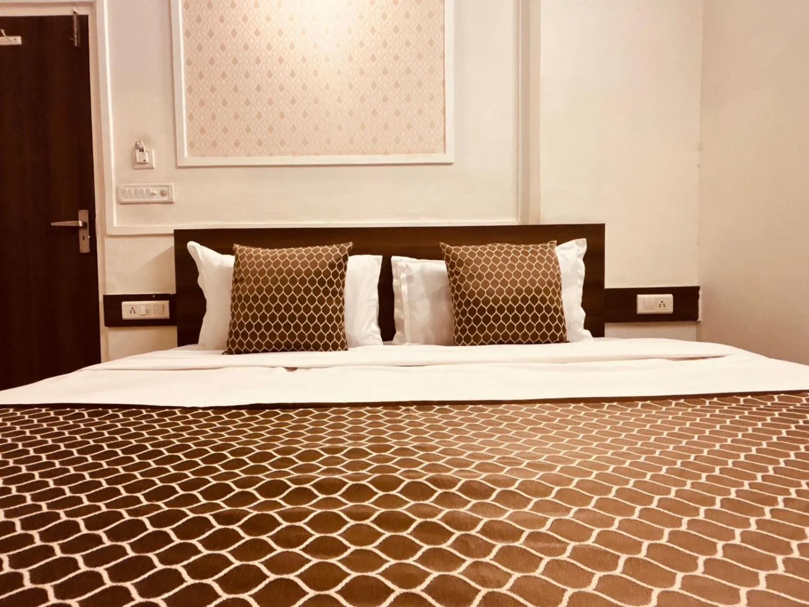 Bed in Majestic Heights Hotel