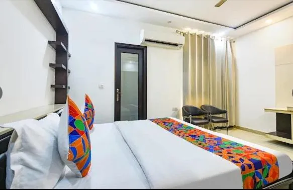 Bed in Hotel GreySky Residency