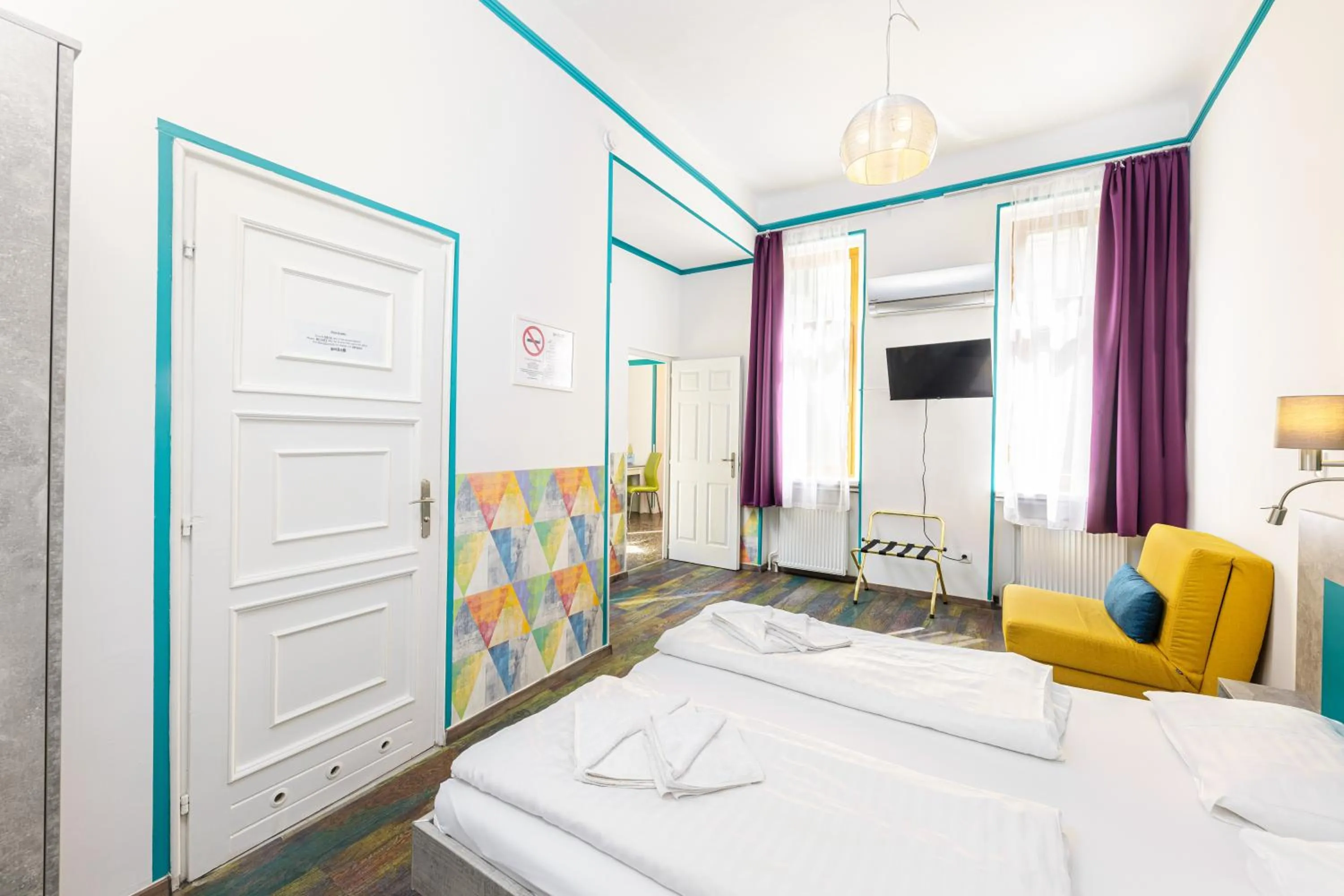 Bed in Amber Terrace Studios Downtown