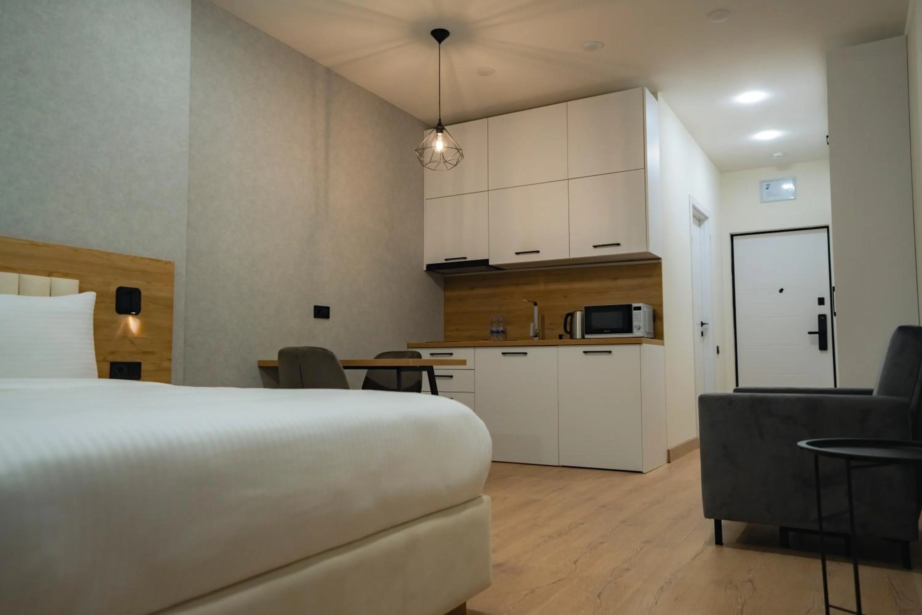 Kitchen or kitchenette, Bed in Solis Residence Aparthotel