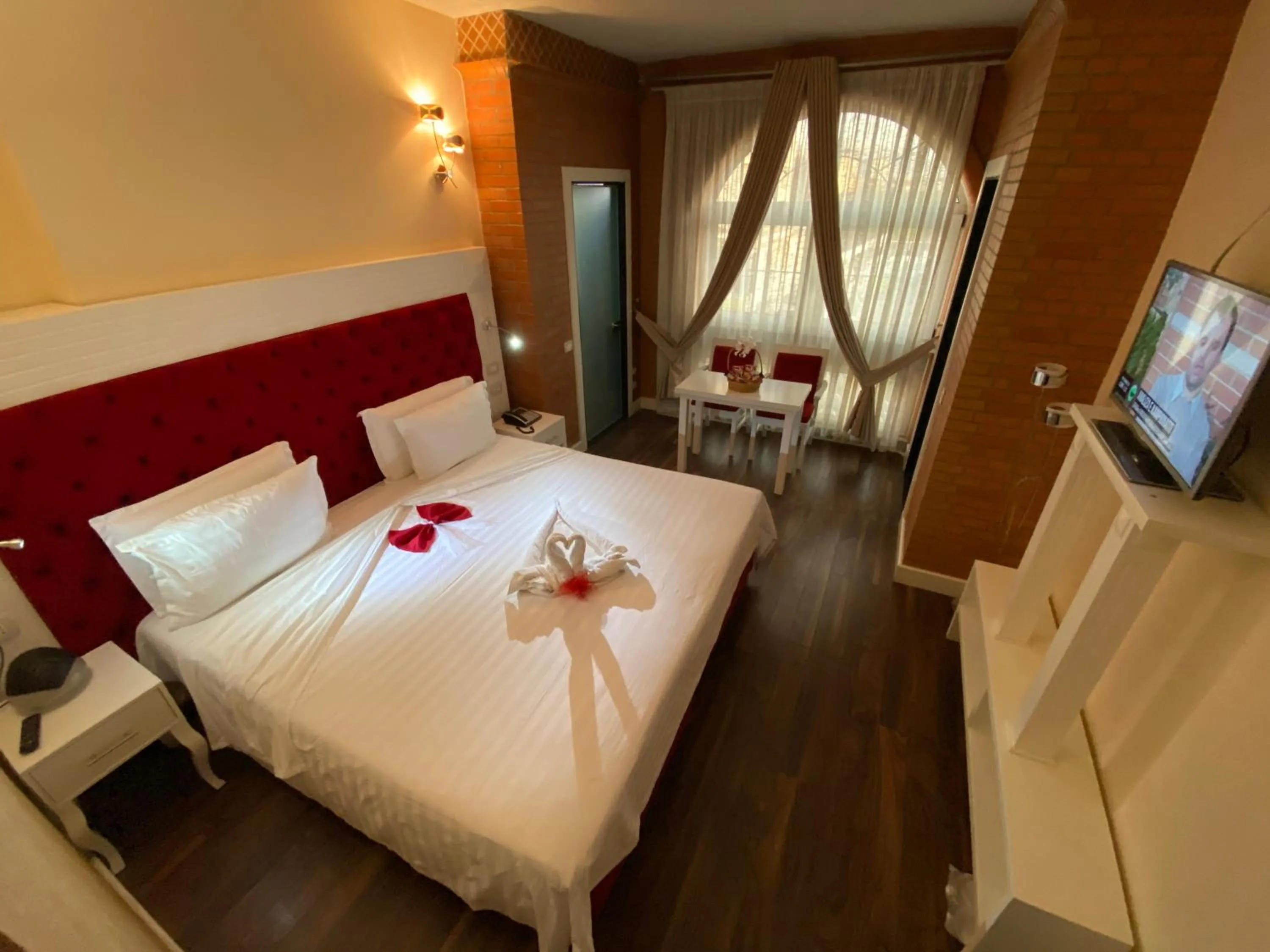 Photo of the whole room, Bed in The Red Bricks Hotel