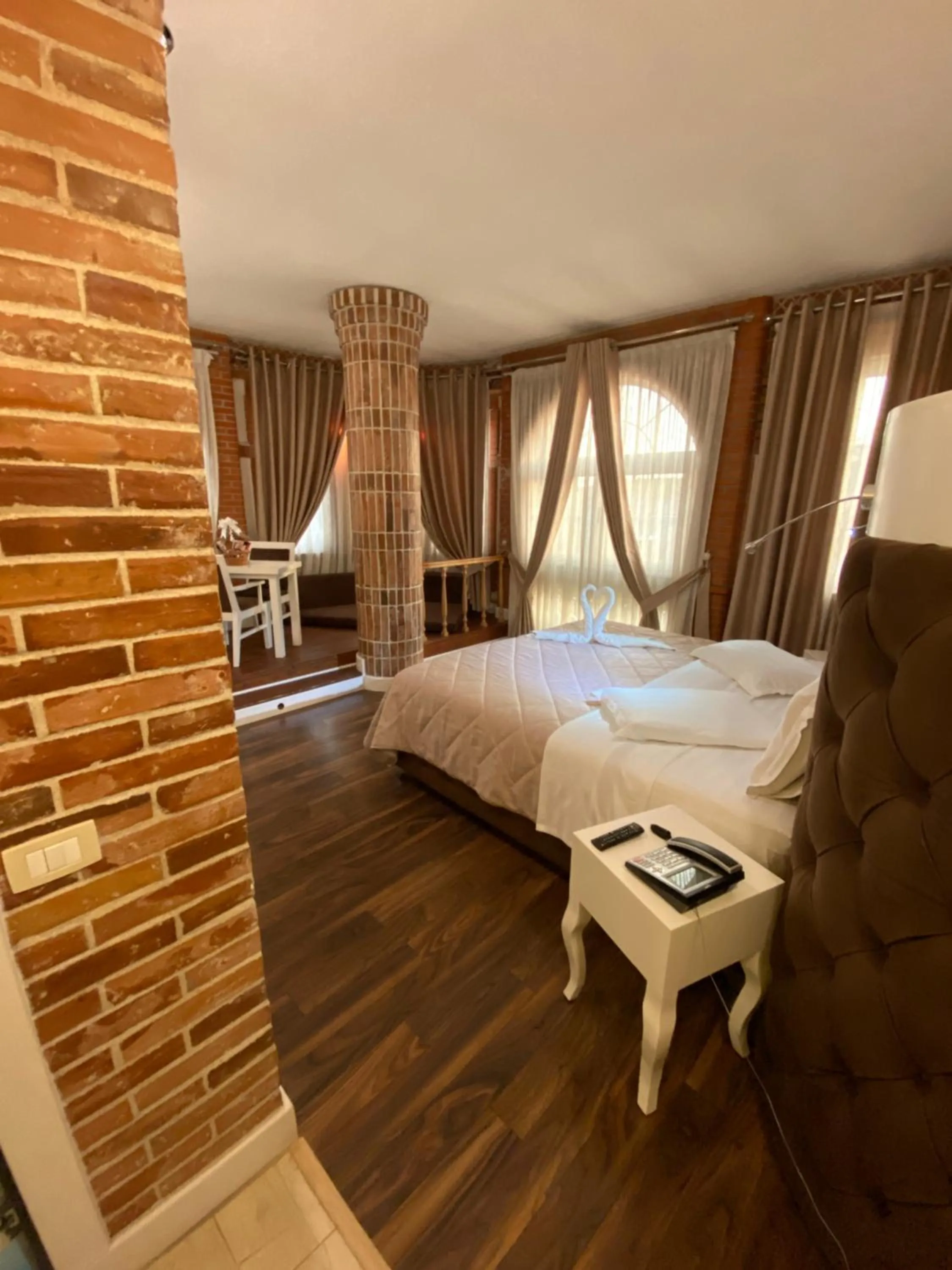 Photo of the whole room, Bed in The Red Bricks Hotel