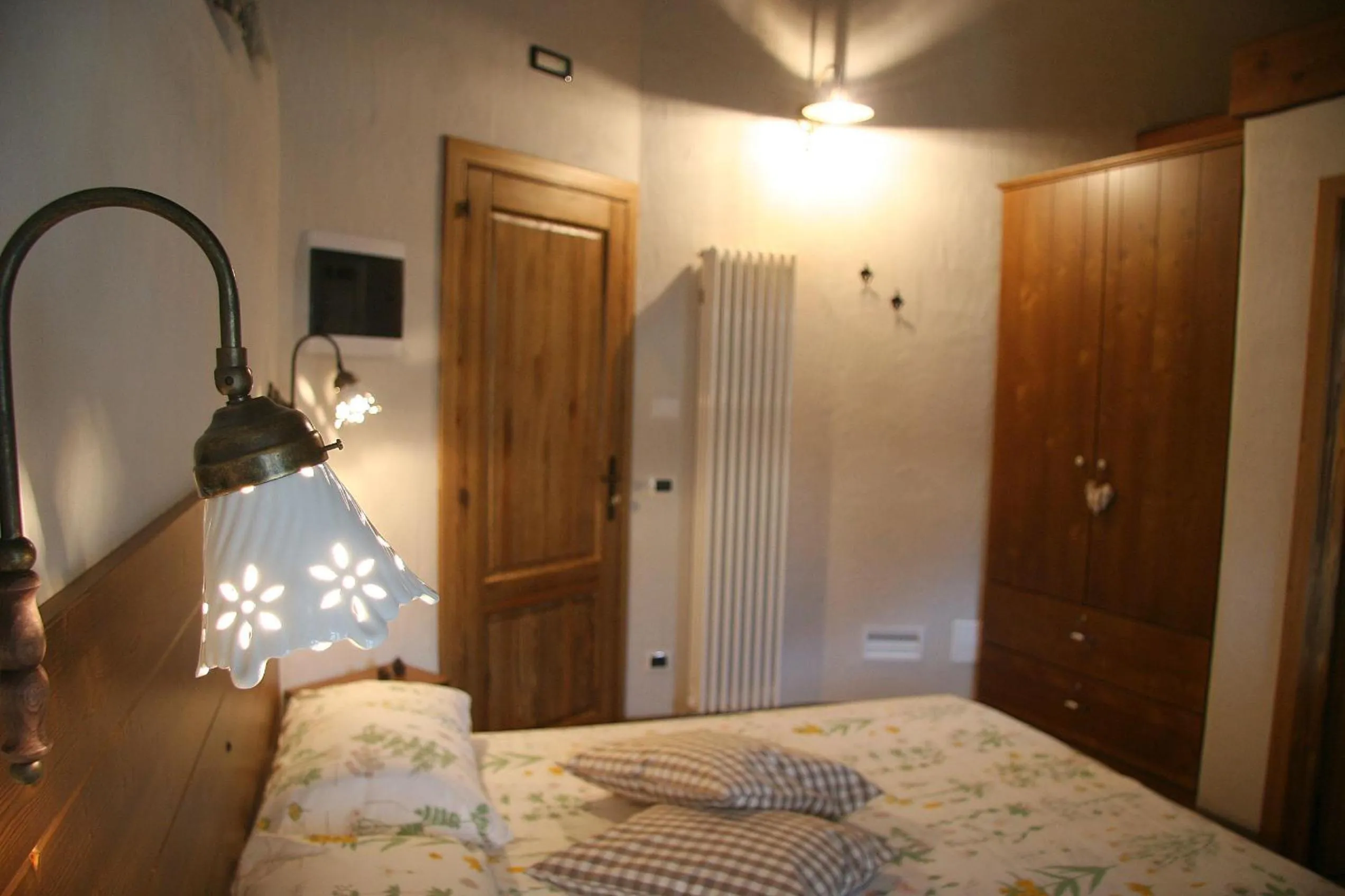 Decorative detail, Bed in Ostello del Castello Tirano