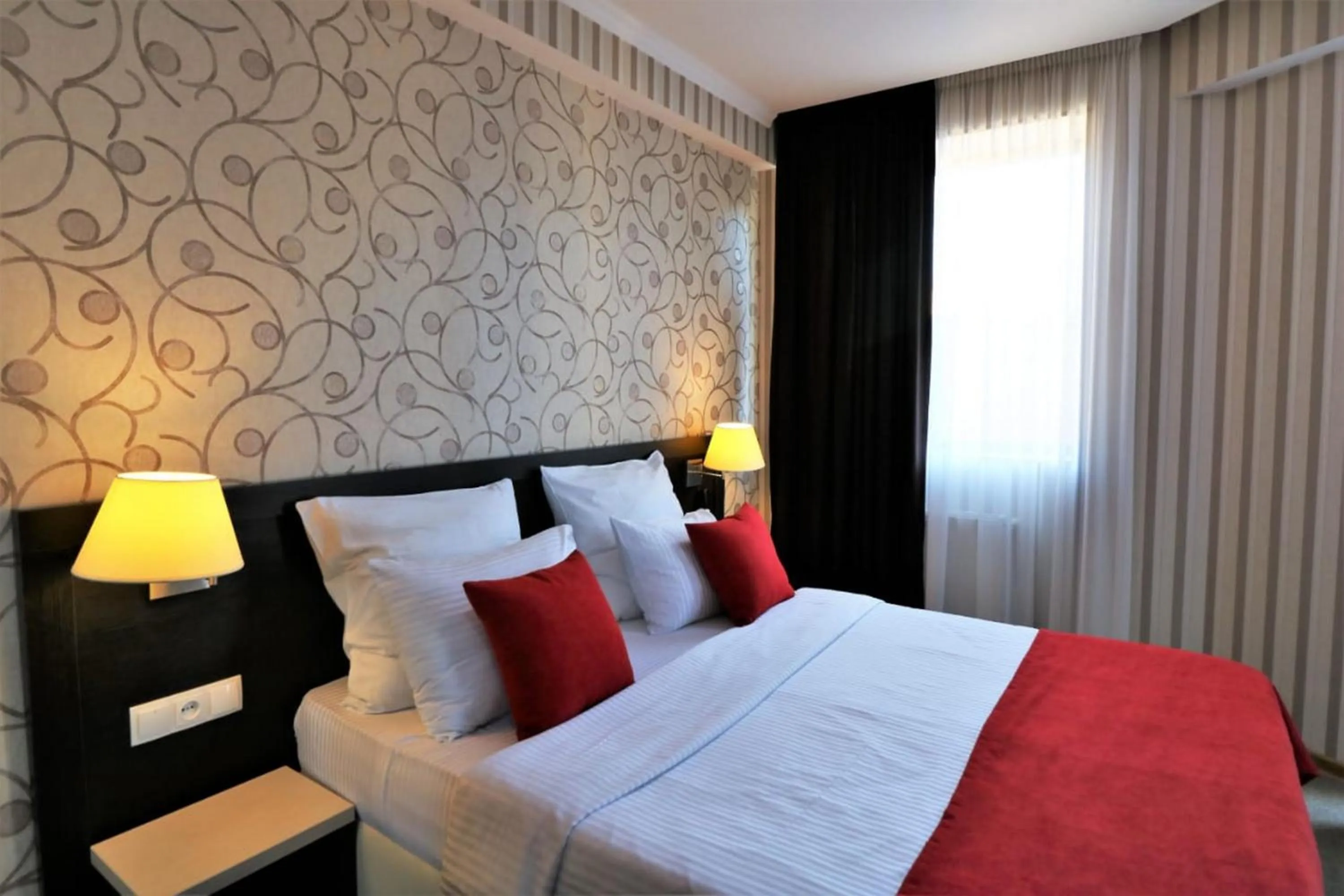 Bed in East Gate Boutique Hotel