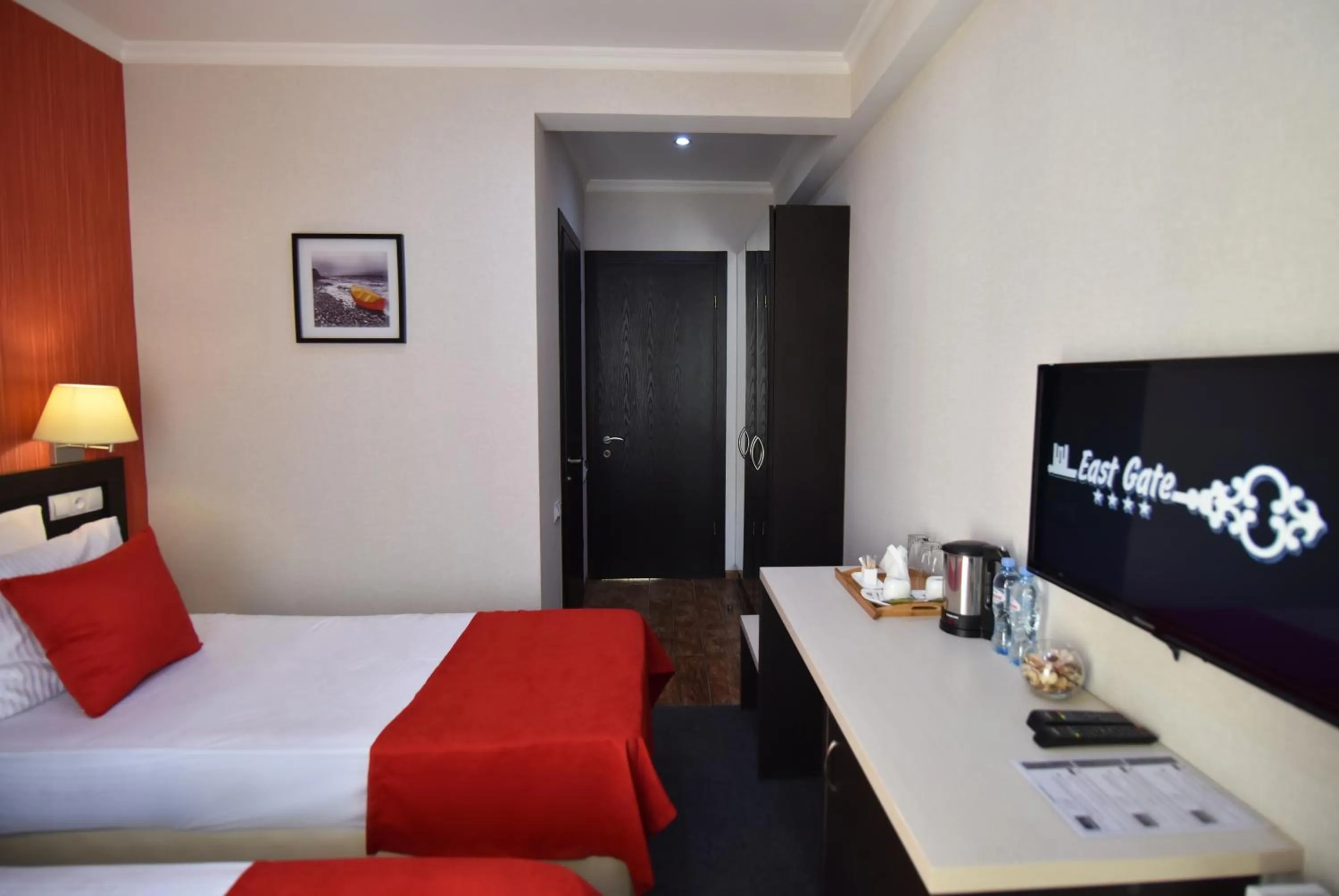 Bed in East Gate Boutique Hotel