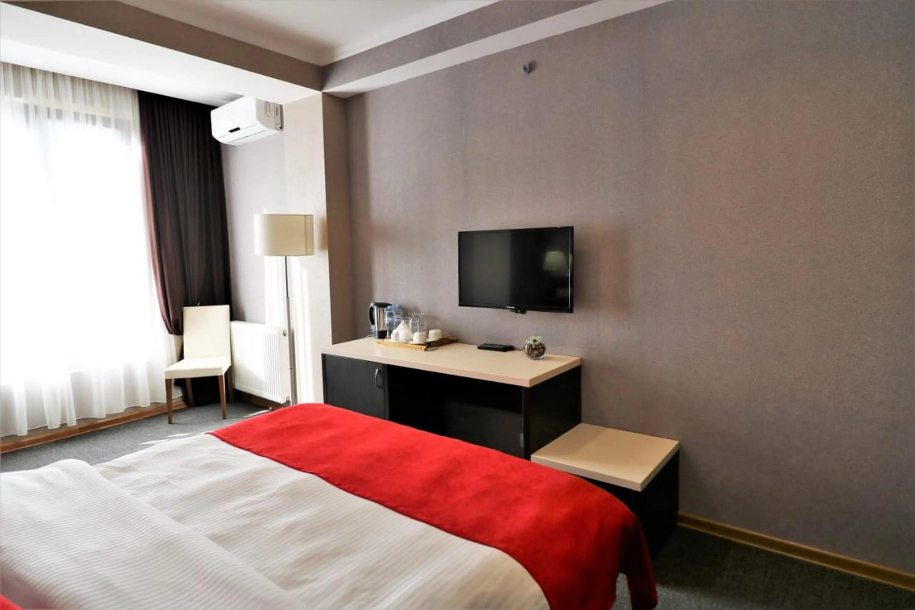 Bed in East Gate Boutique Hotel