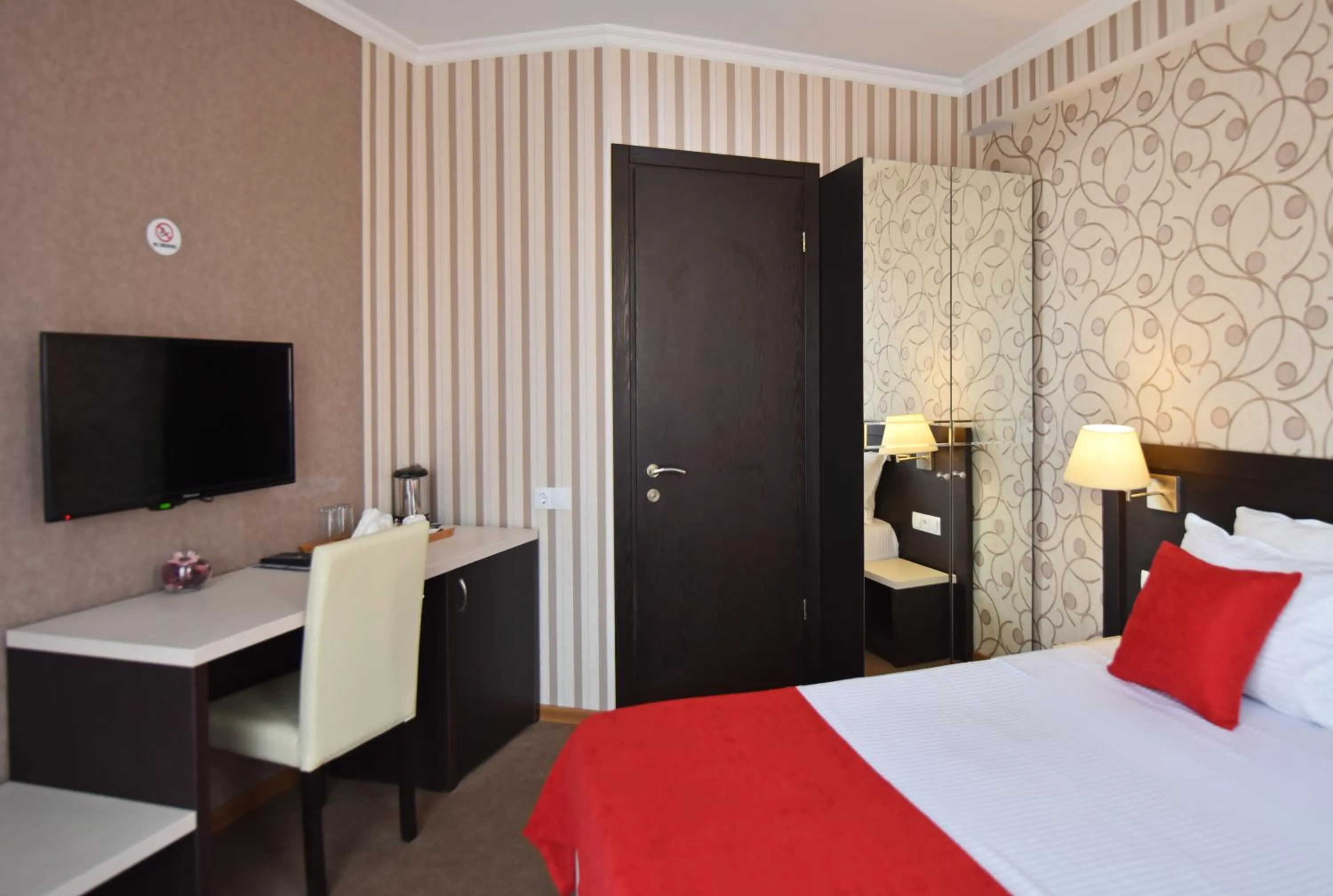 Bed in East Gate Boutique Hotel