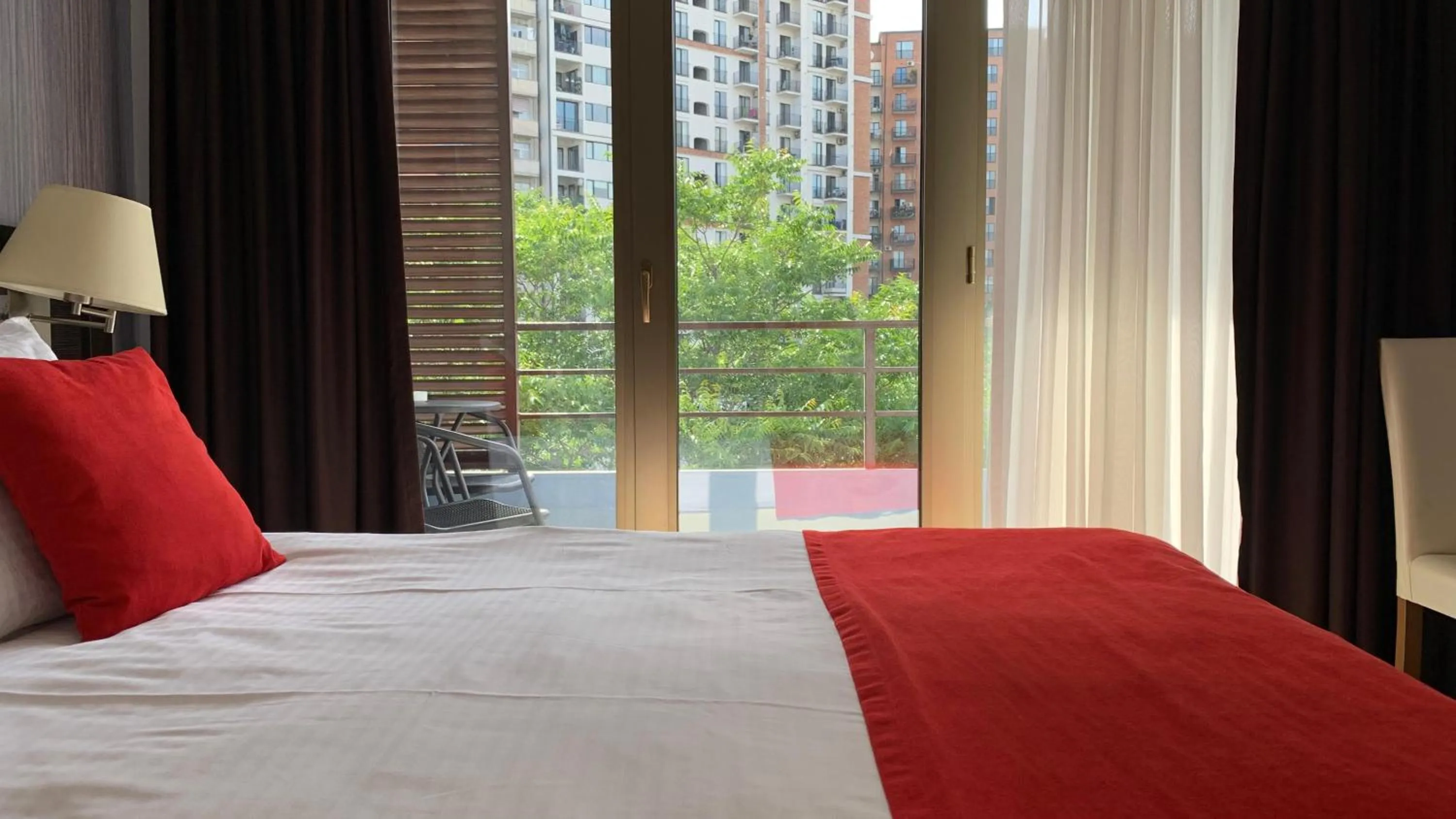 Balcony/Terrace, Bed in East Gate Boutique Hotel