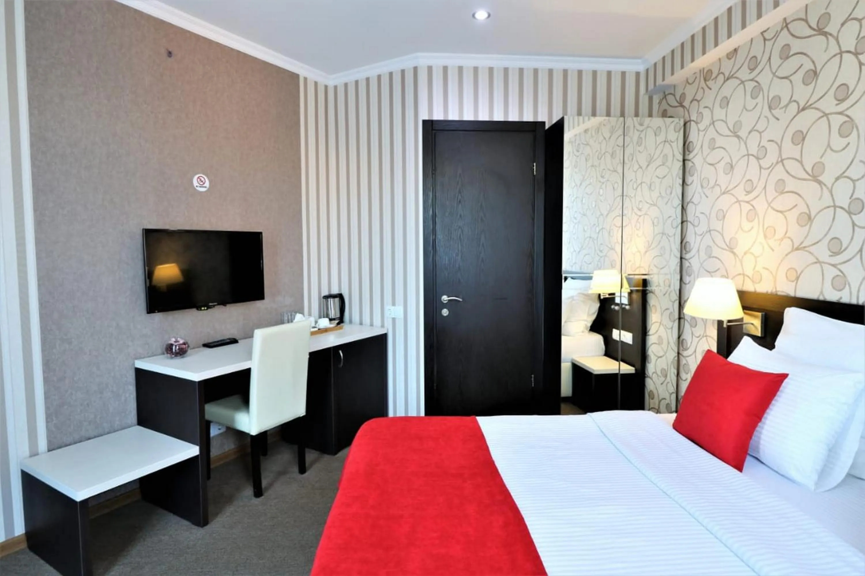 Photo of the whole room, Bed in East Gate Boutique Hotel