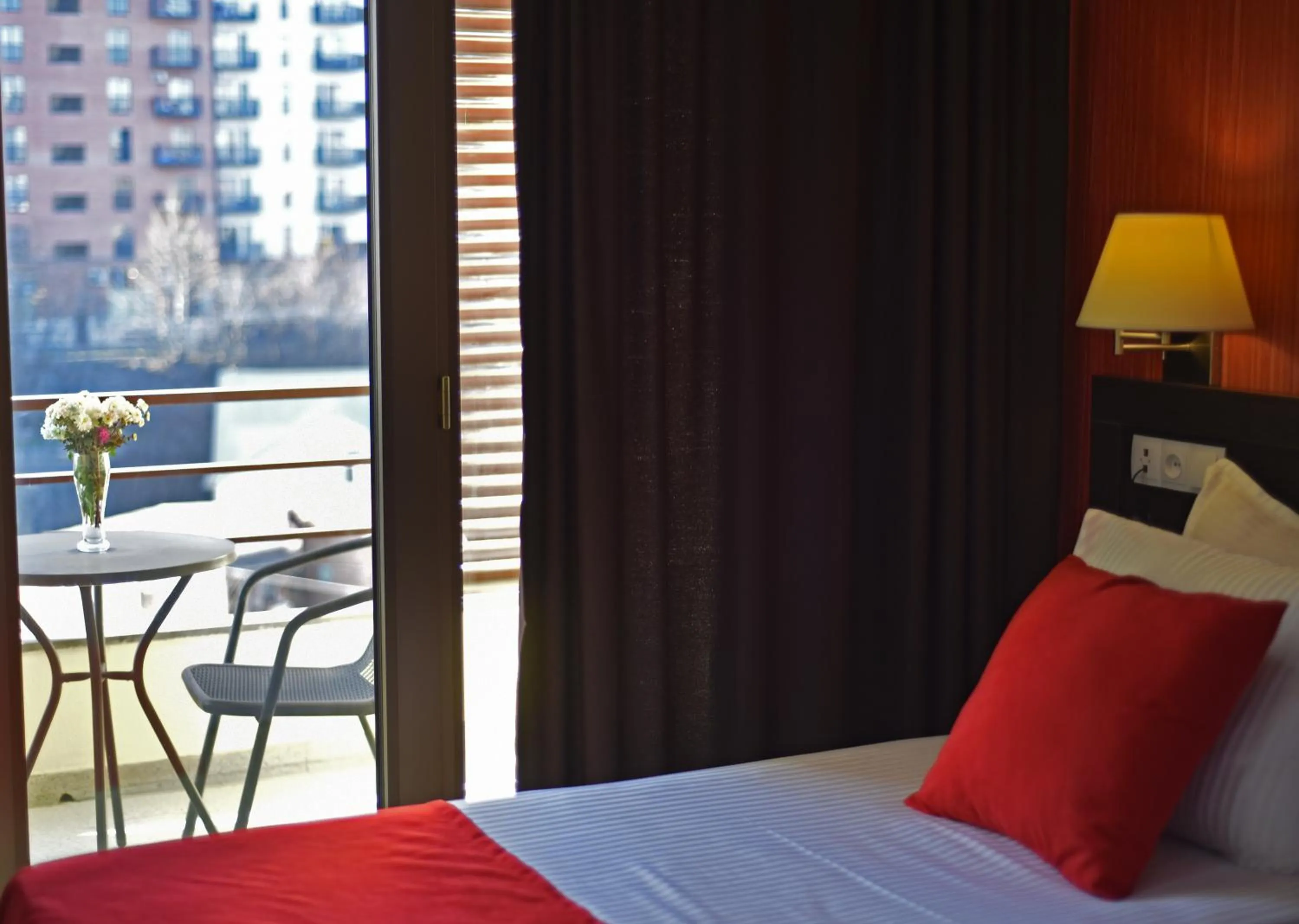 Balcony/Terrace, Bed in East Gate Boutique Hotel