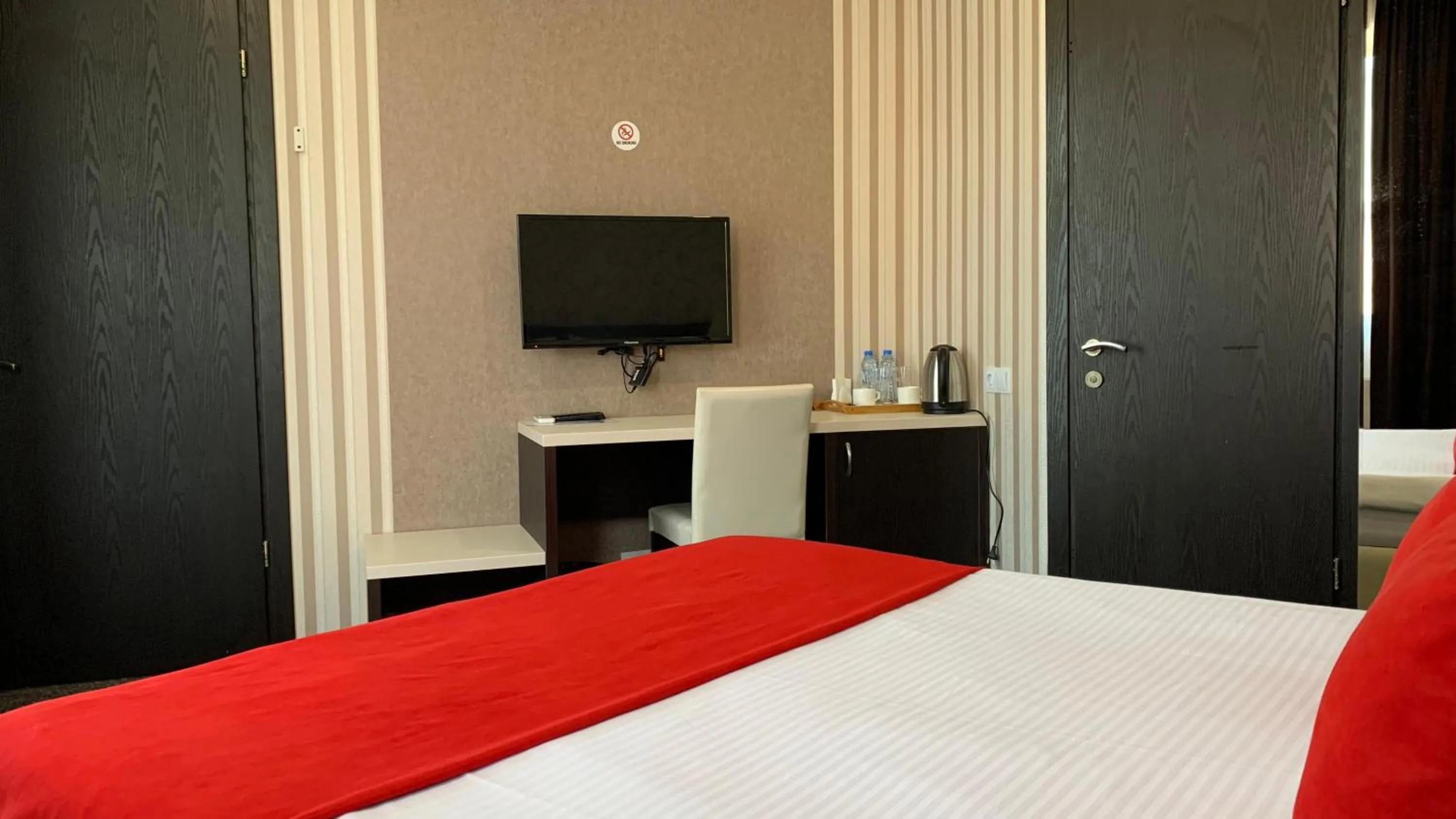 TV and multimedia, Bed in East Gate Boutique Hotel