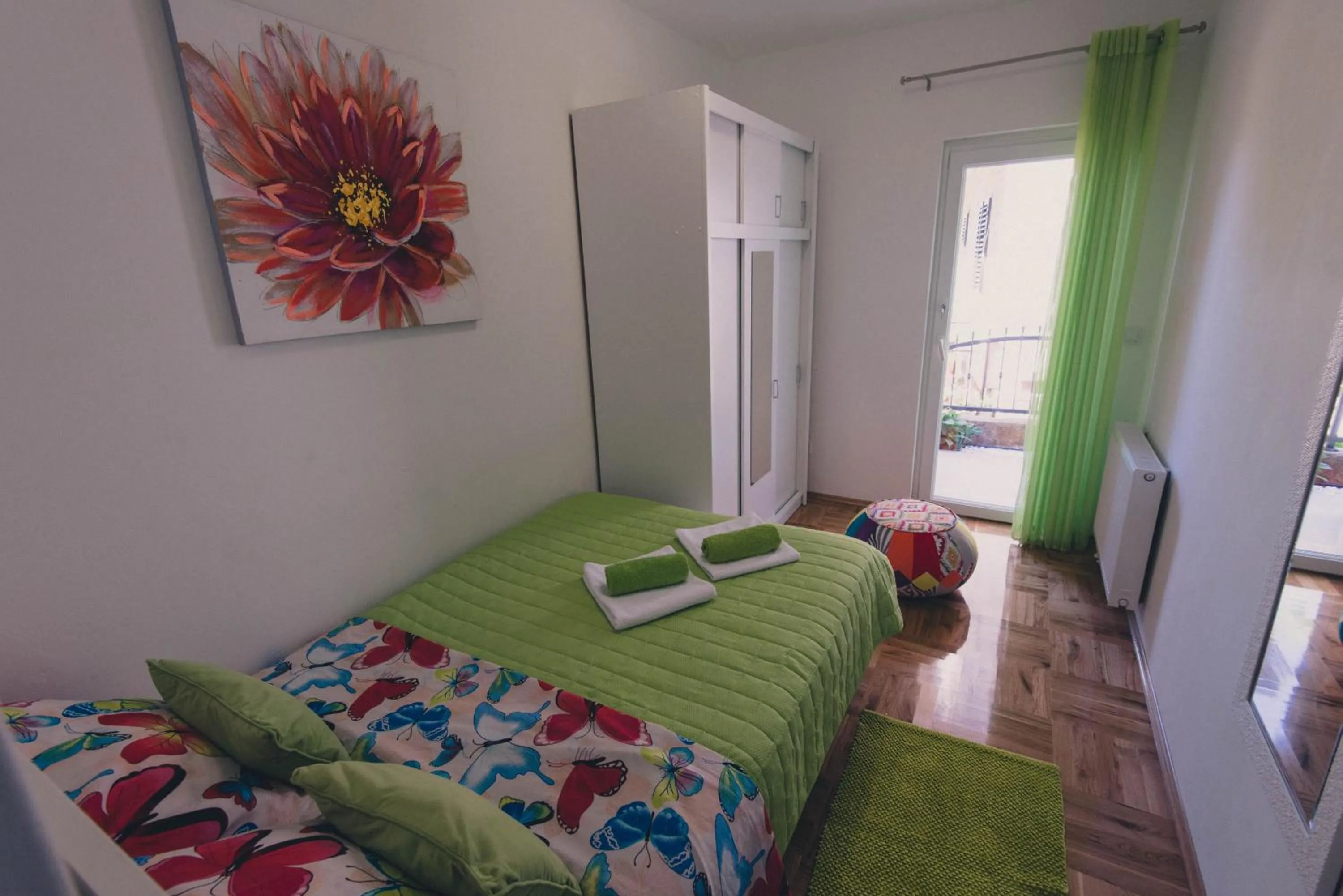 Bedroom, Bed in Apartments Sunny Garden