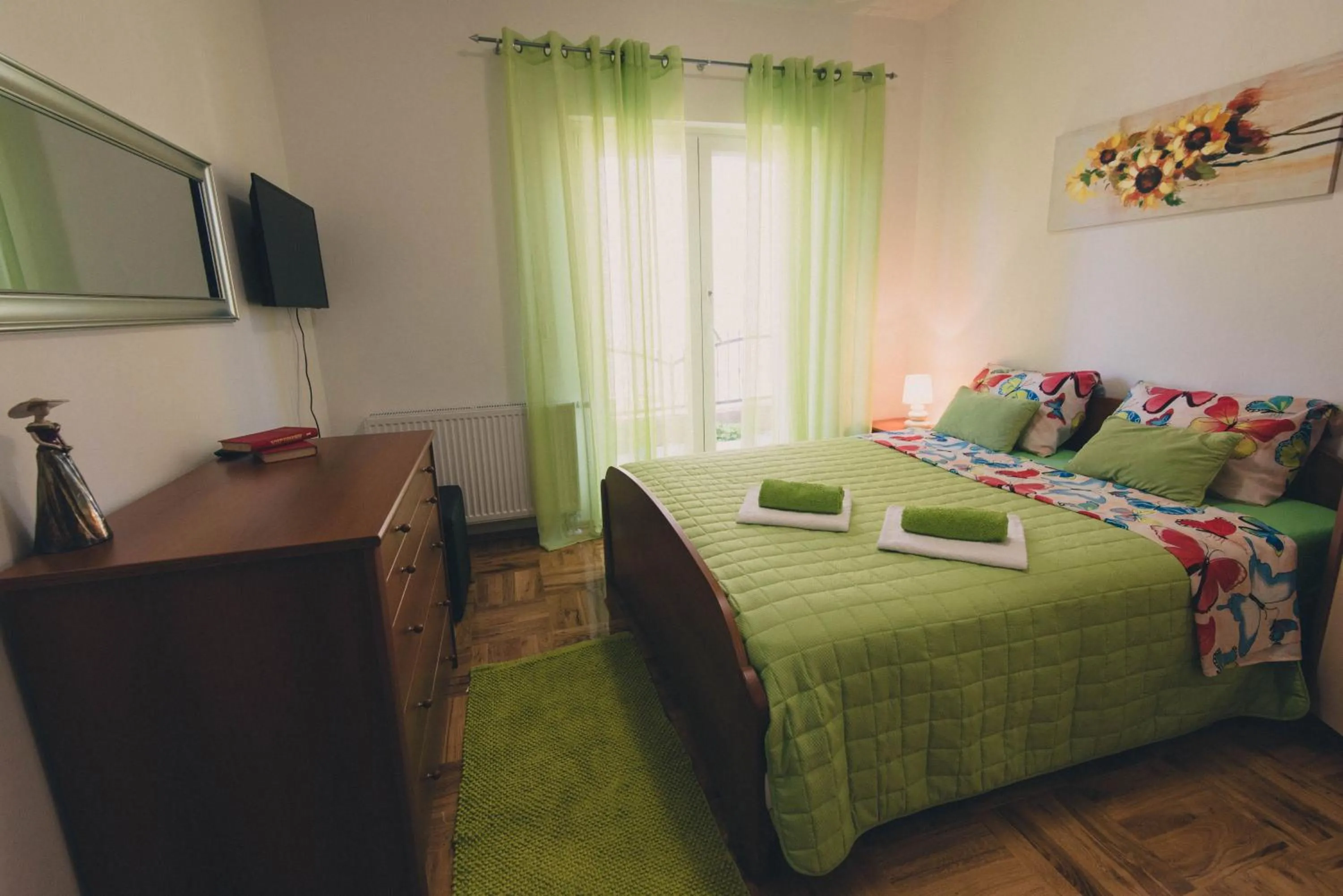 Bedroom, Bed in Apartments Sunny Garden