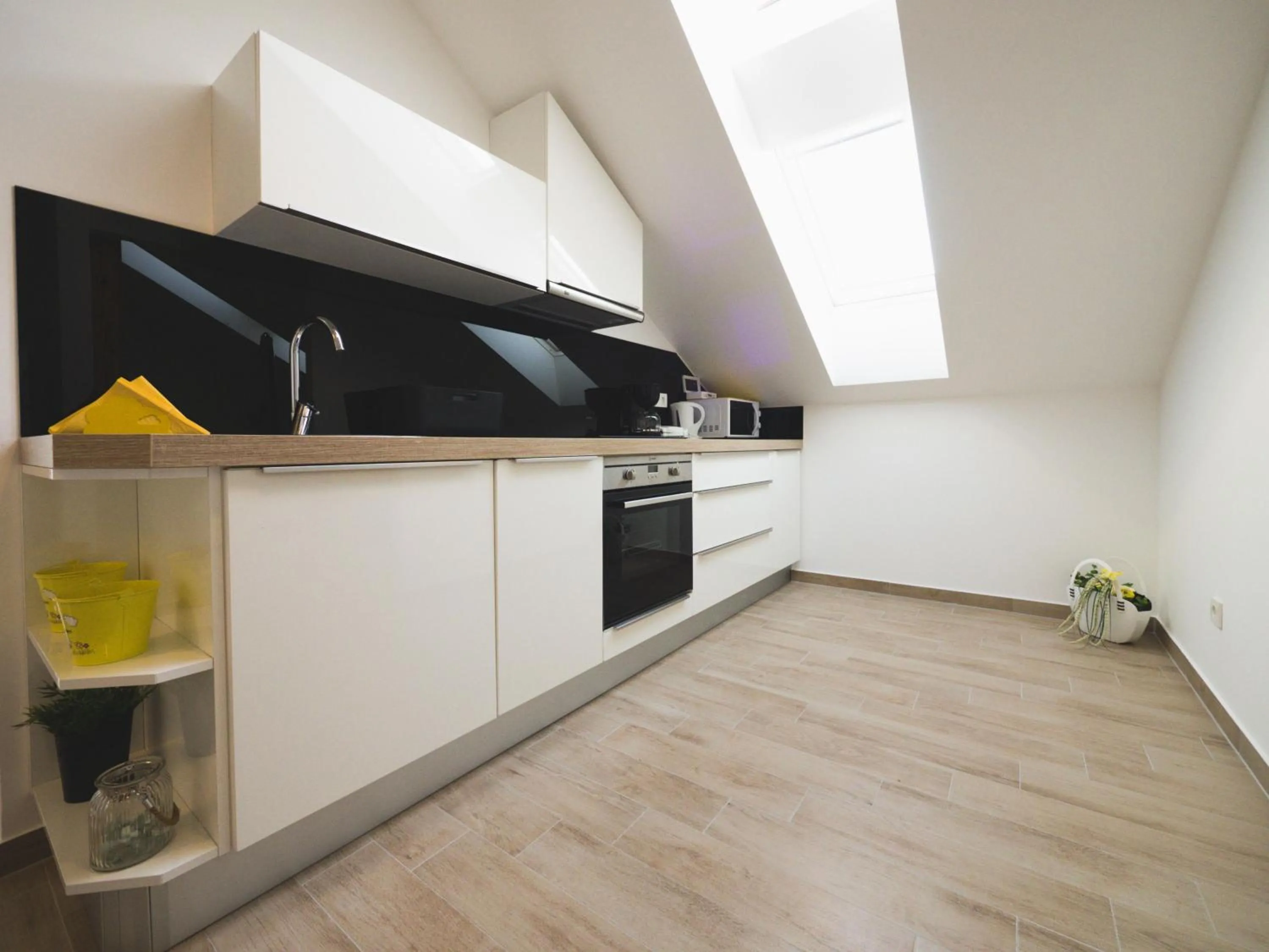Kitchen or kitchenette in Apartments Sunny Garden