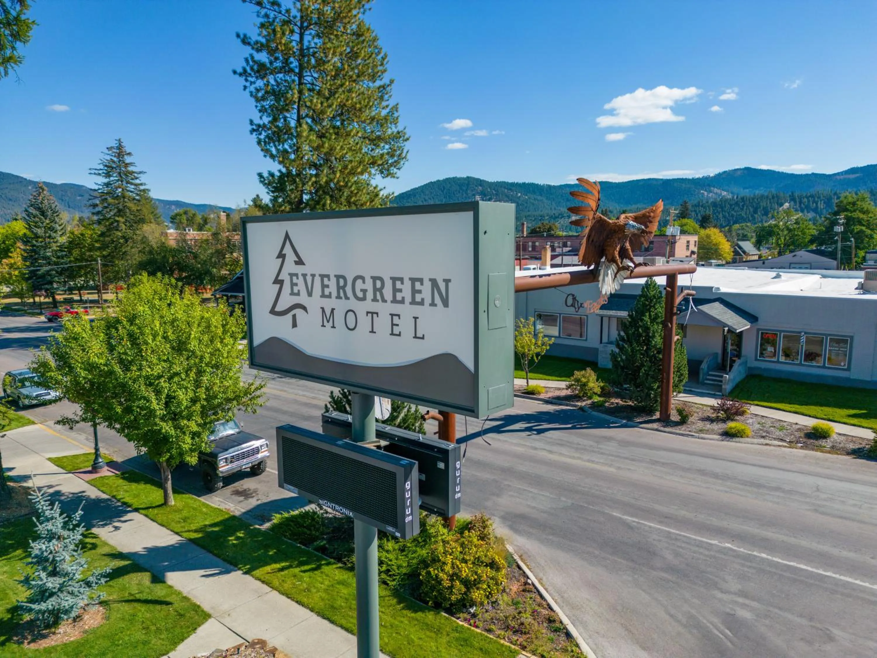Property logo or sign in Evergreen Motel