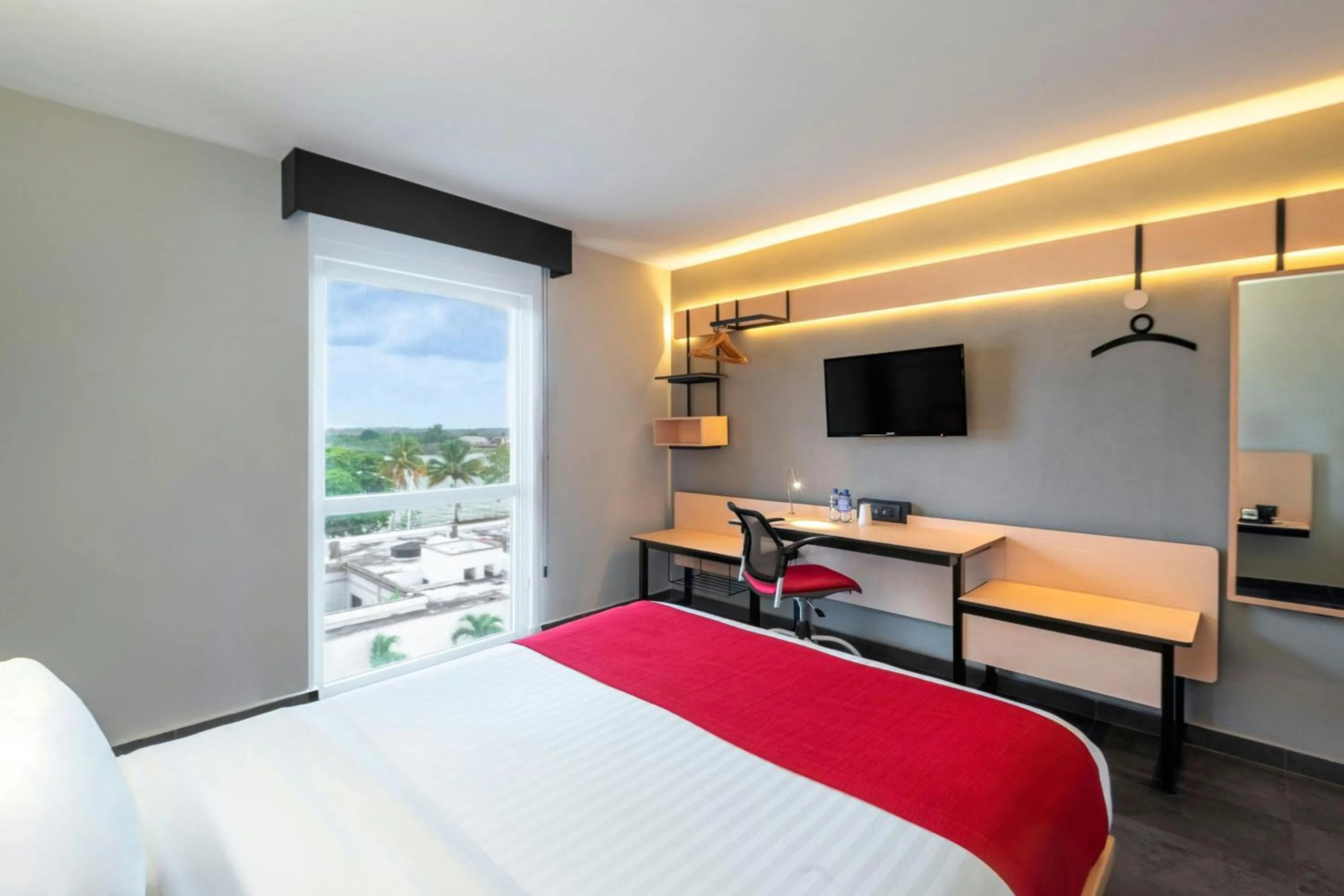 Photo of the whole room, Bed in City Express by Marriott Tuxpan