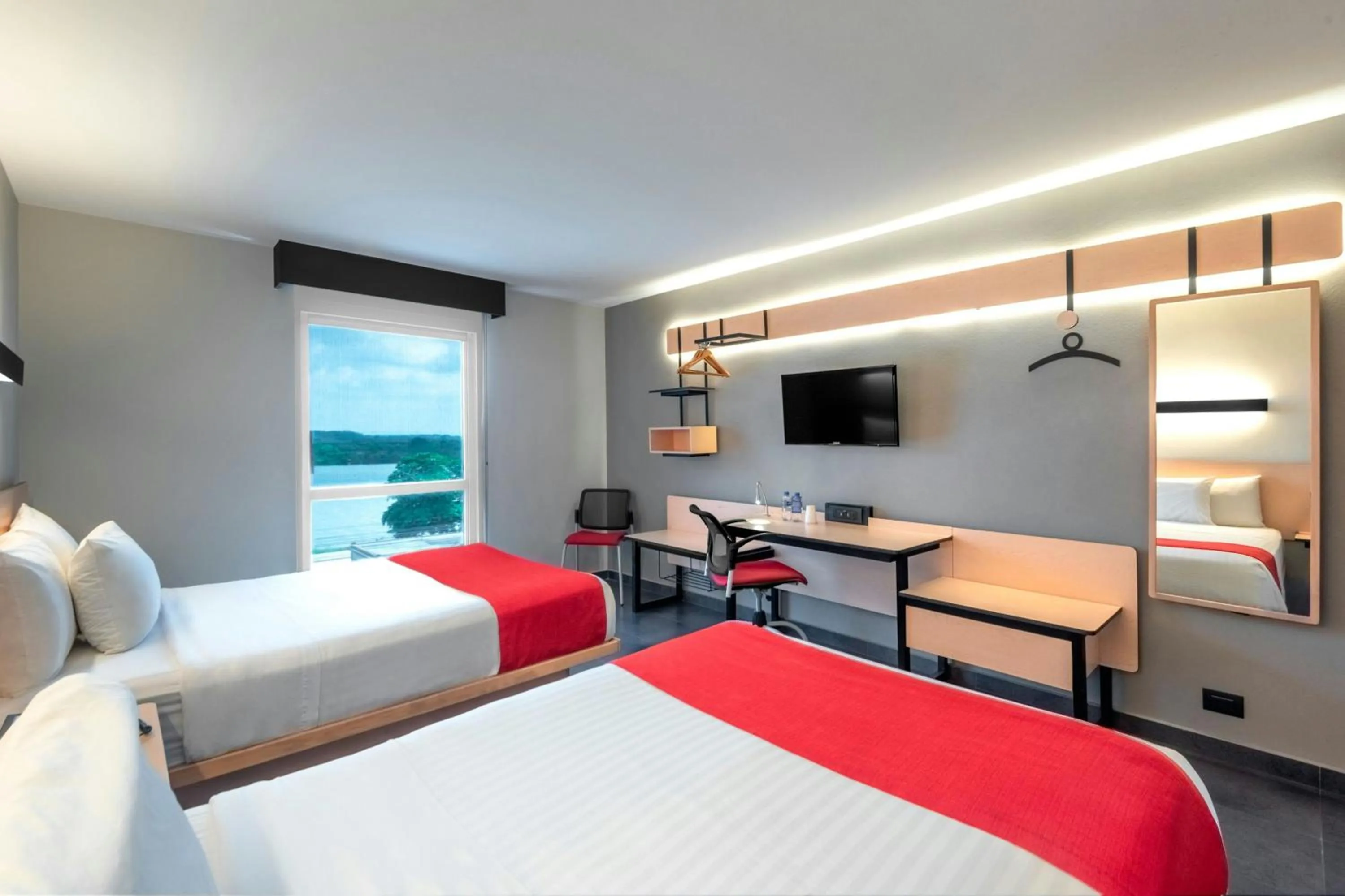 Photo of the whole room, Bed in City Express by Marriott Tuxpan