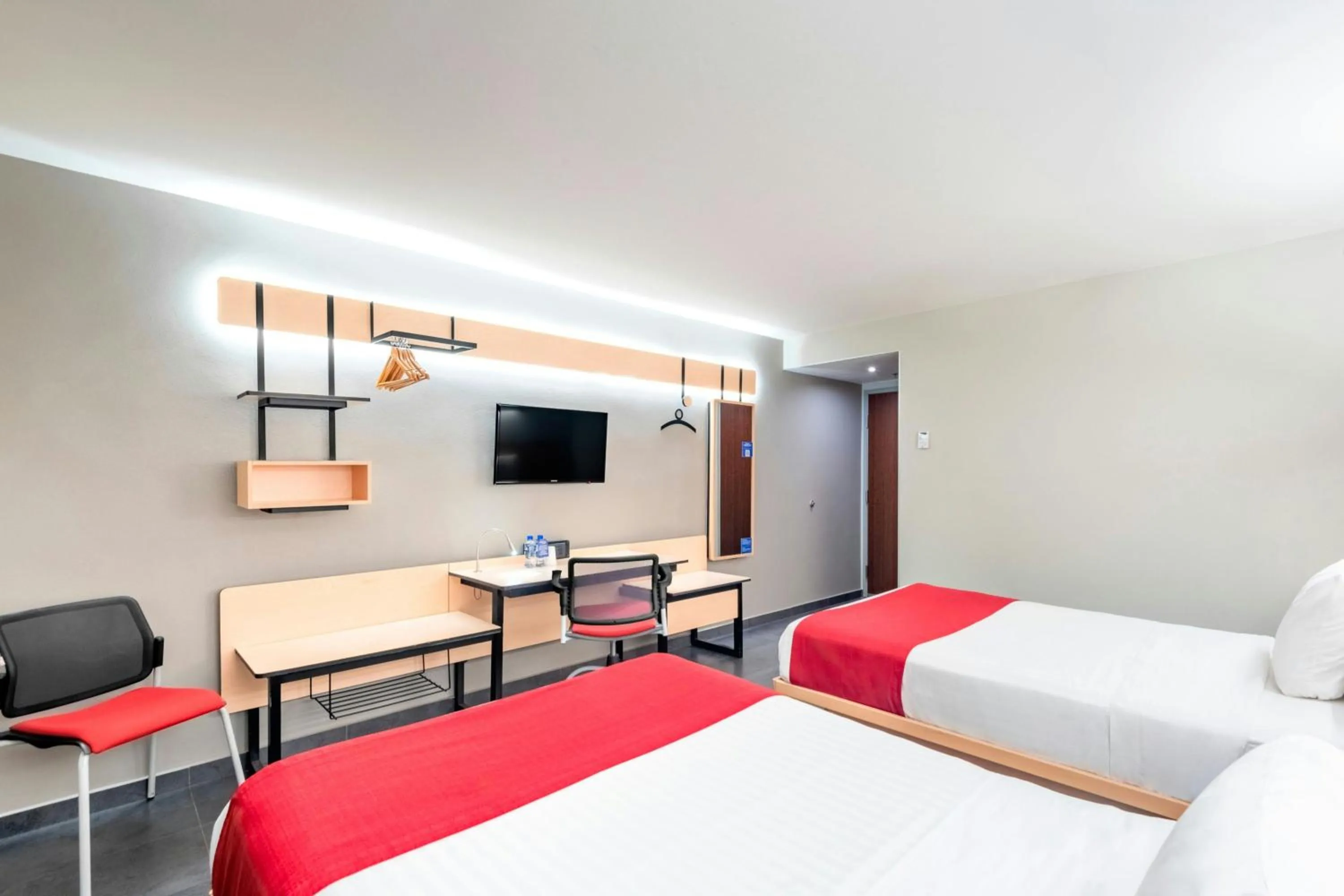 Photo of the whole room, Bed in City Express by Marriott Tuxpan