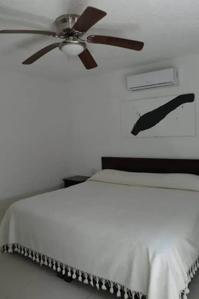 Bed in Las Gaviotas Hotel and Suites Bed in Las Gaviotas Hotel and Suites