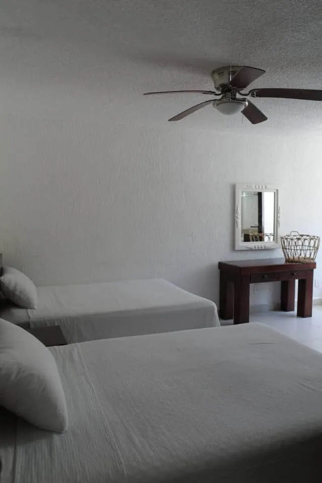 Bed in Las Gaviotas Hotel and Suites