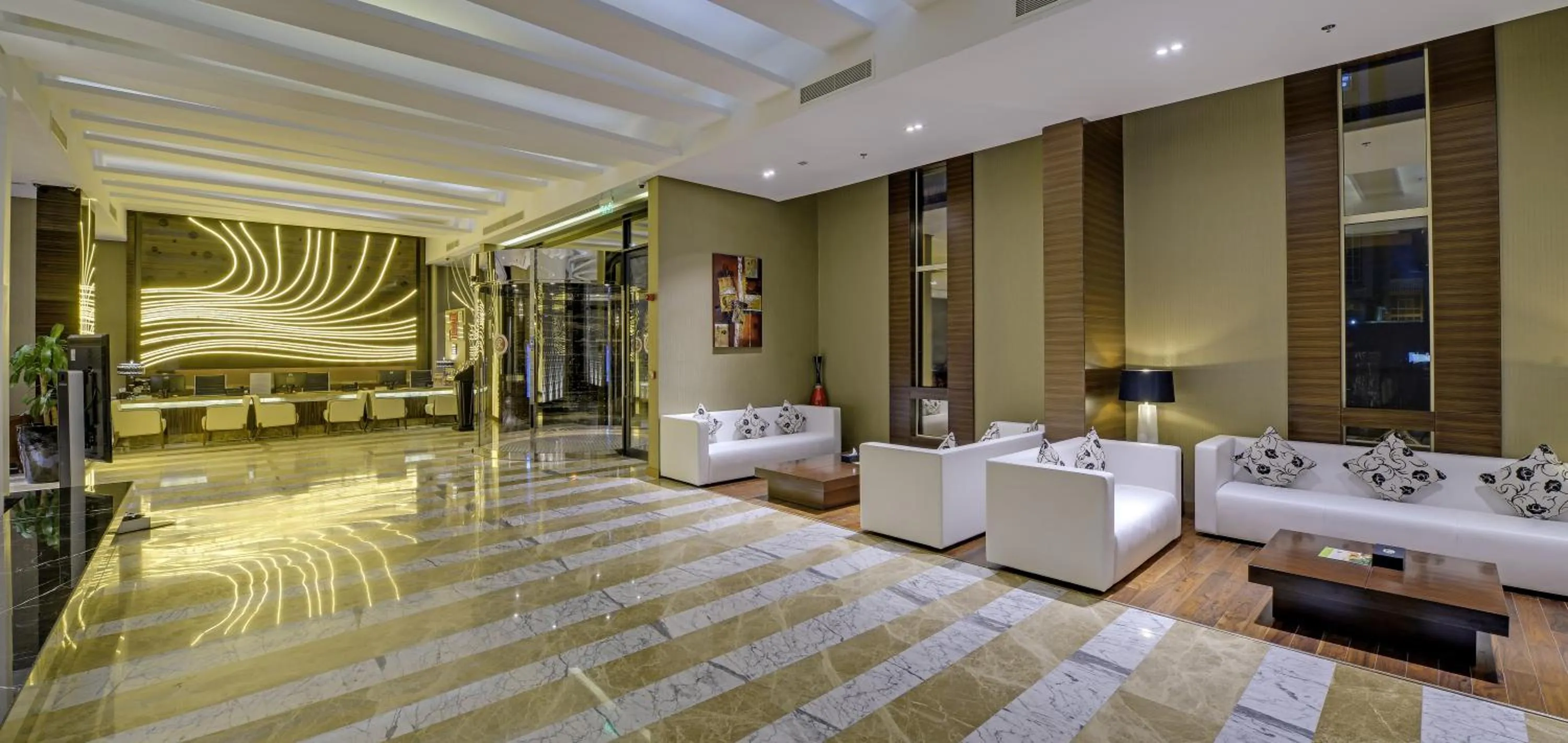 Lobby or reception in Ramee Rose Hotel