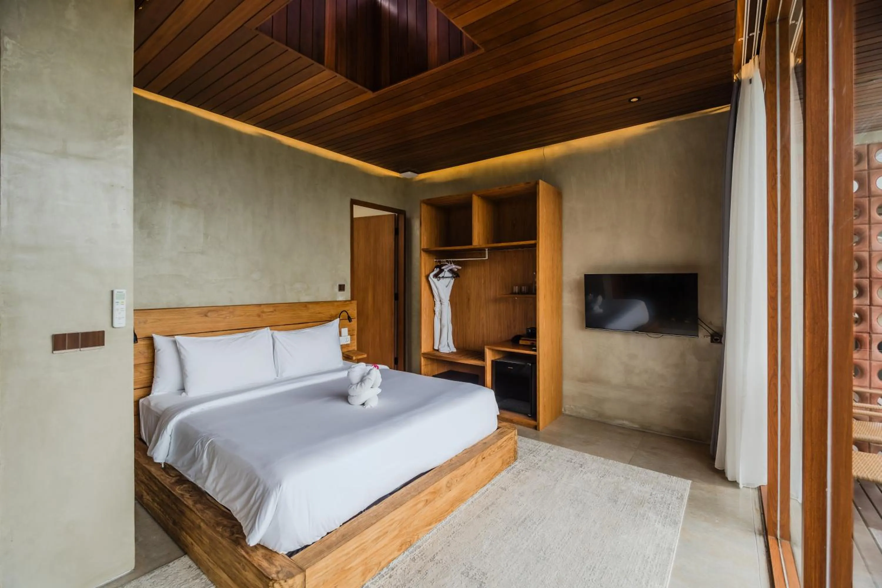 Bed in Lawangkala Resort Ubud