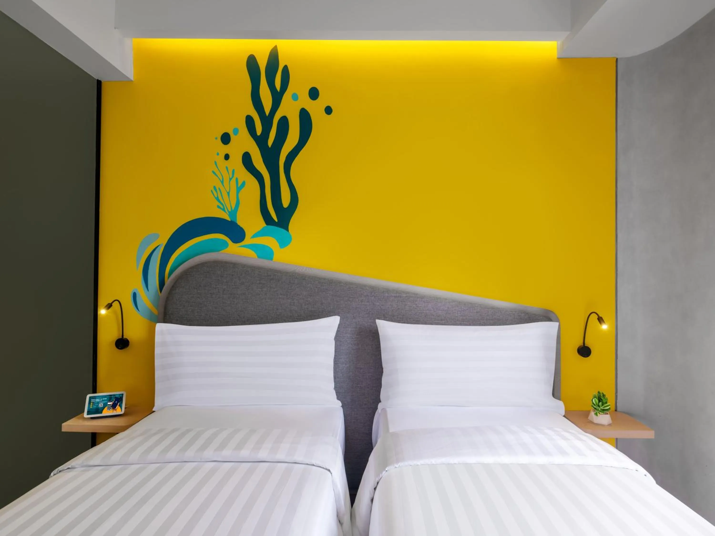 Bed in Quest Vibe Dewi Sri Bali