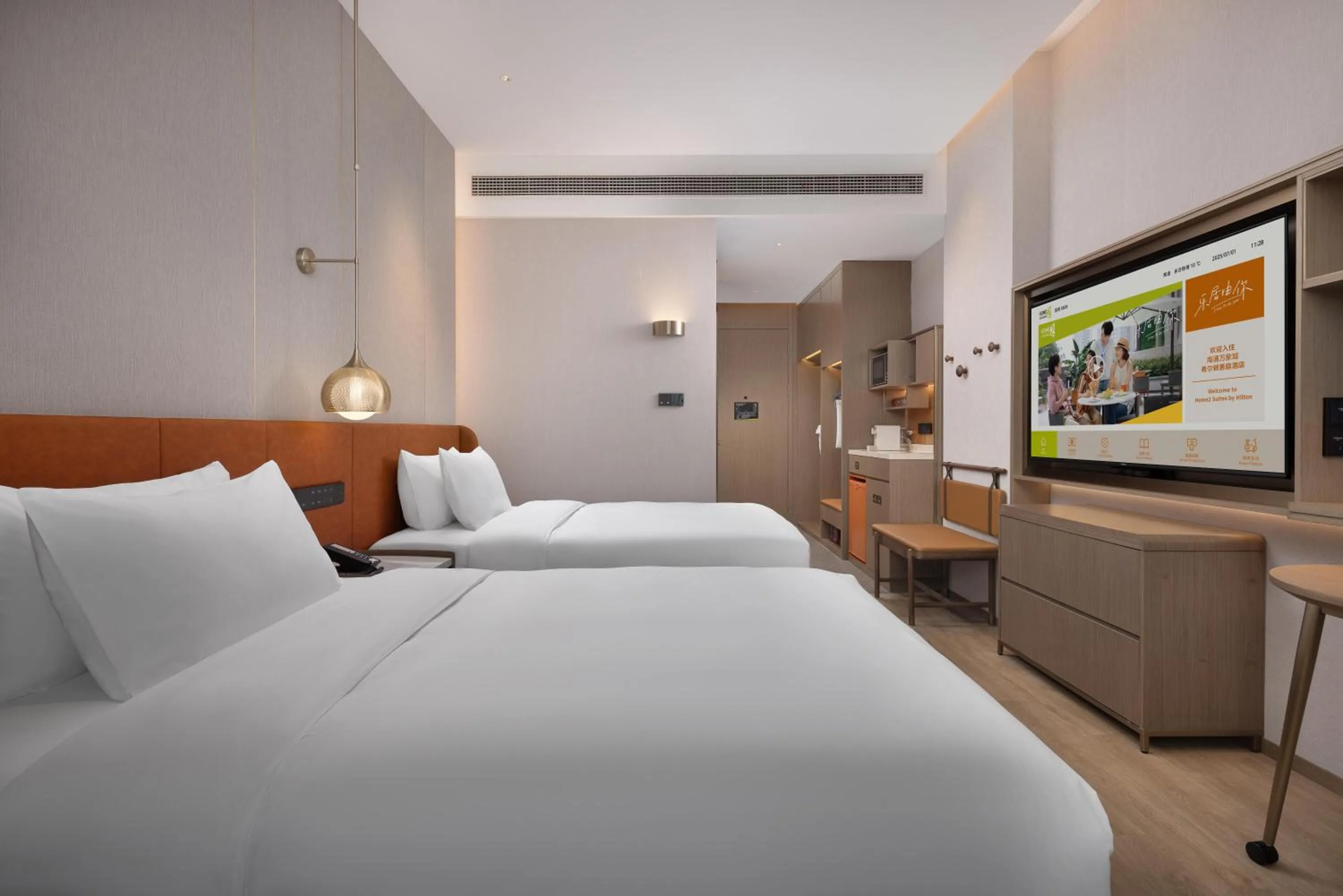 Bed in Home2 Suite by Hilton Nantong Vientiane City