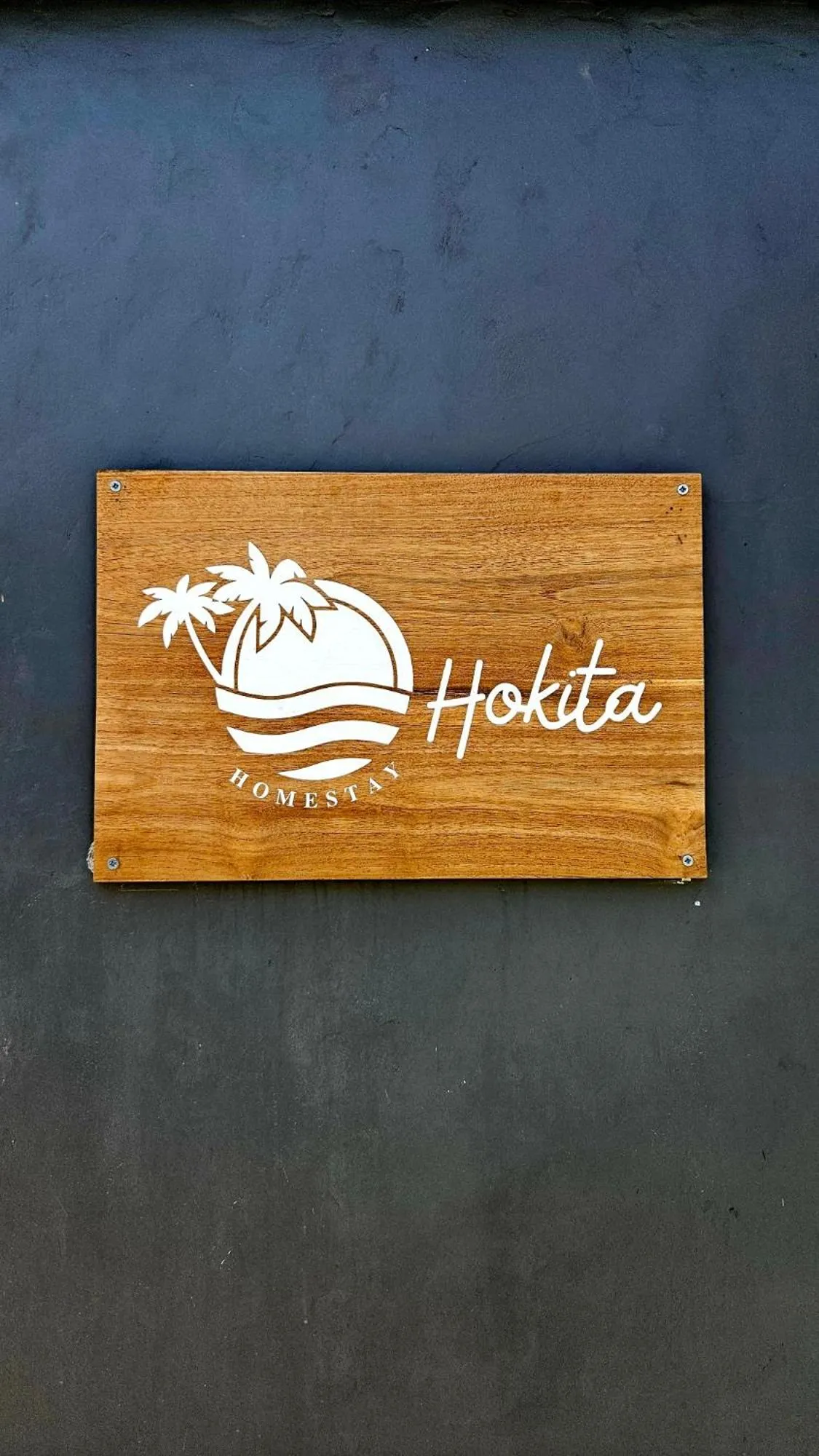 Property logo or sign in Hokita Home Stay