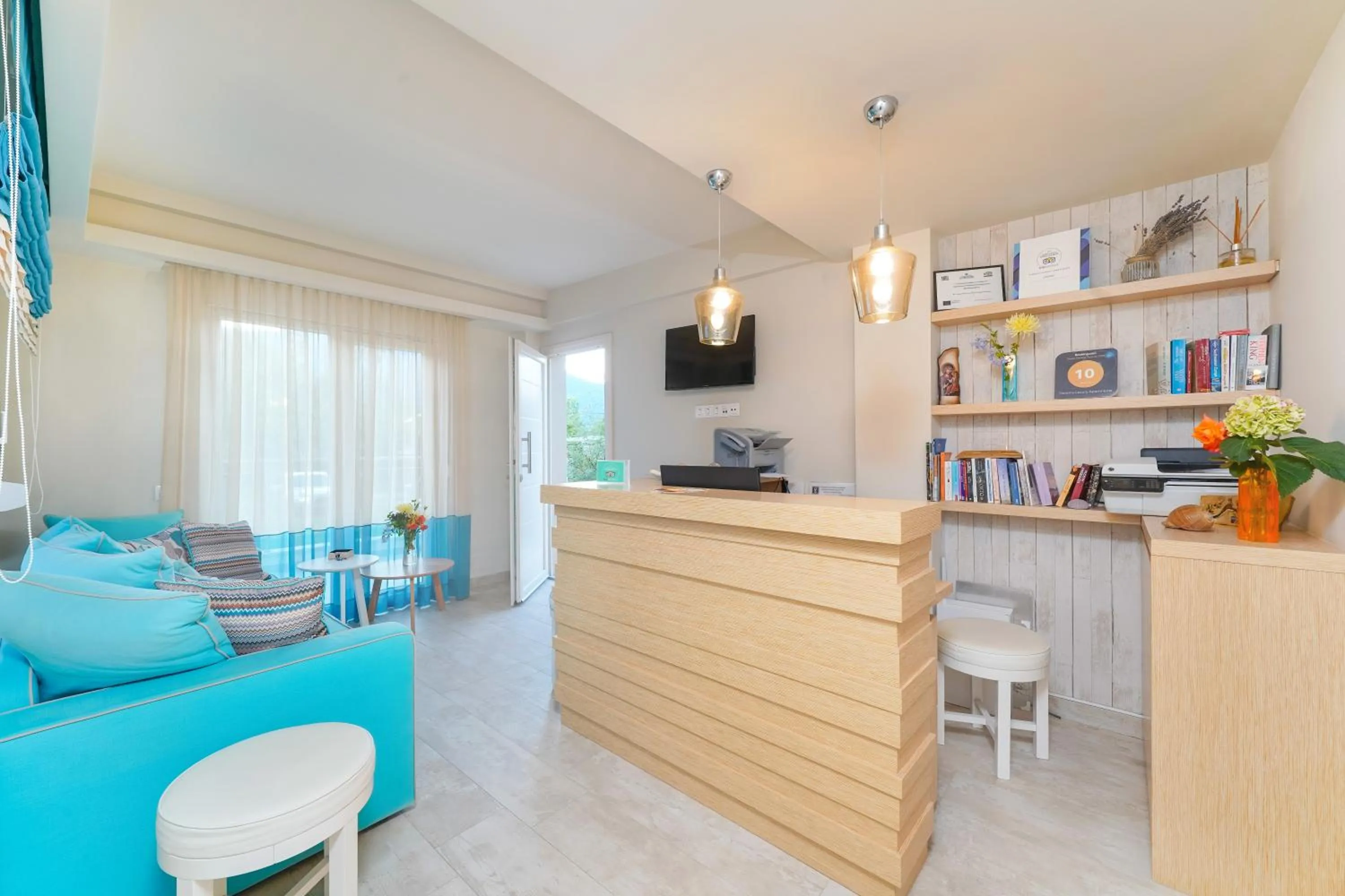 Communal lounge/ TV room in Iliorama Luxury Apartments