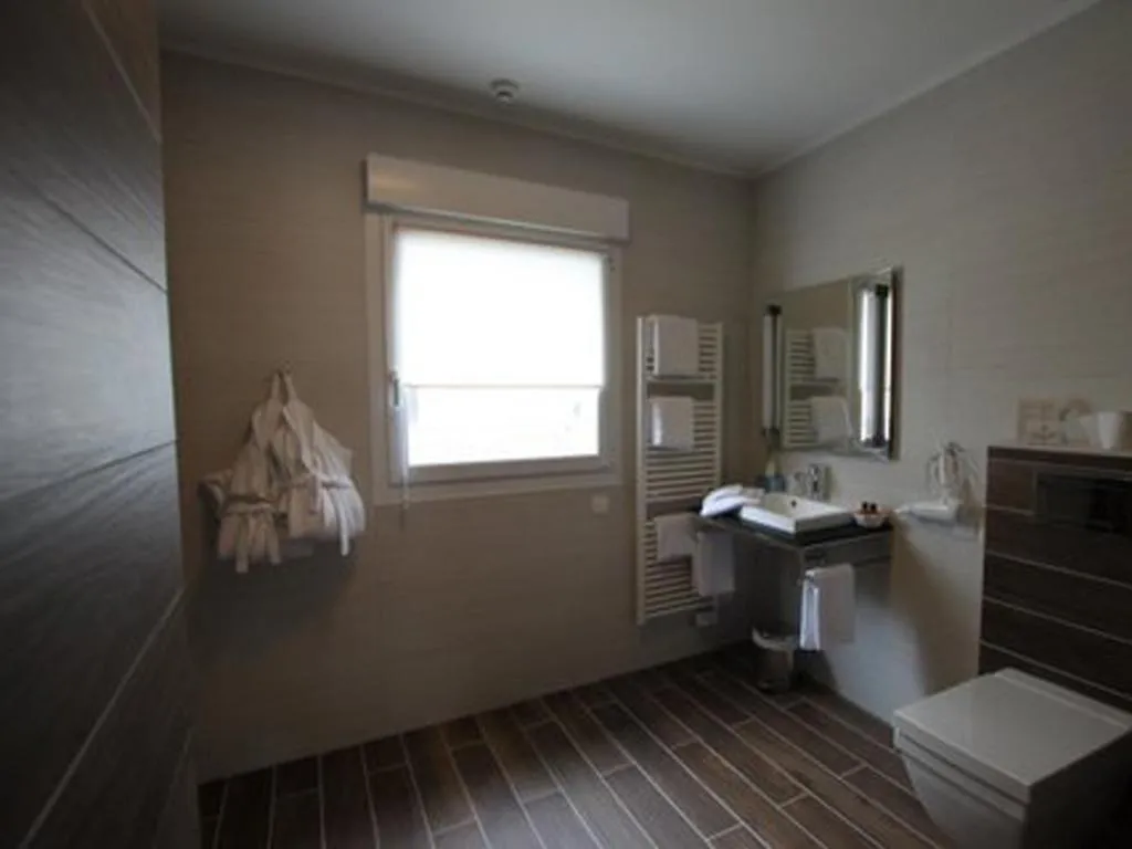 Bathroom in Hôtel Le Cheval Blanc