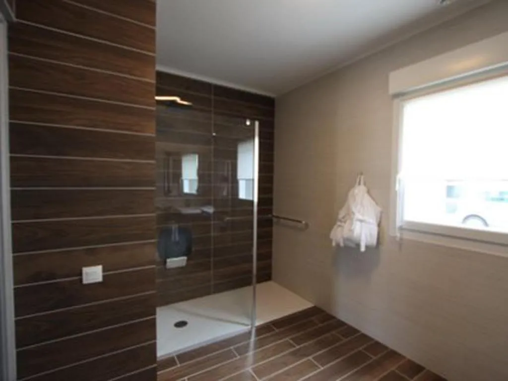 Bathroom in Hôtel Le Cheval Blanc
