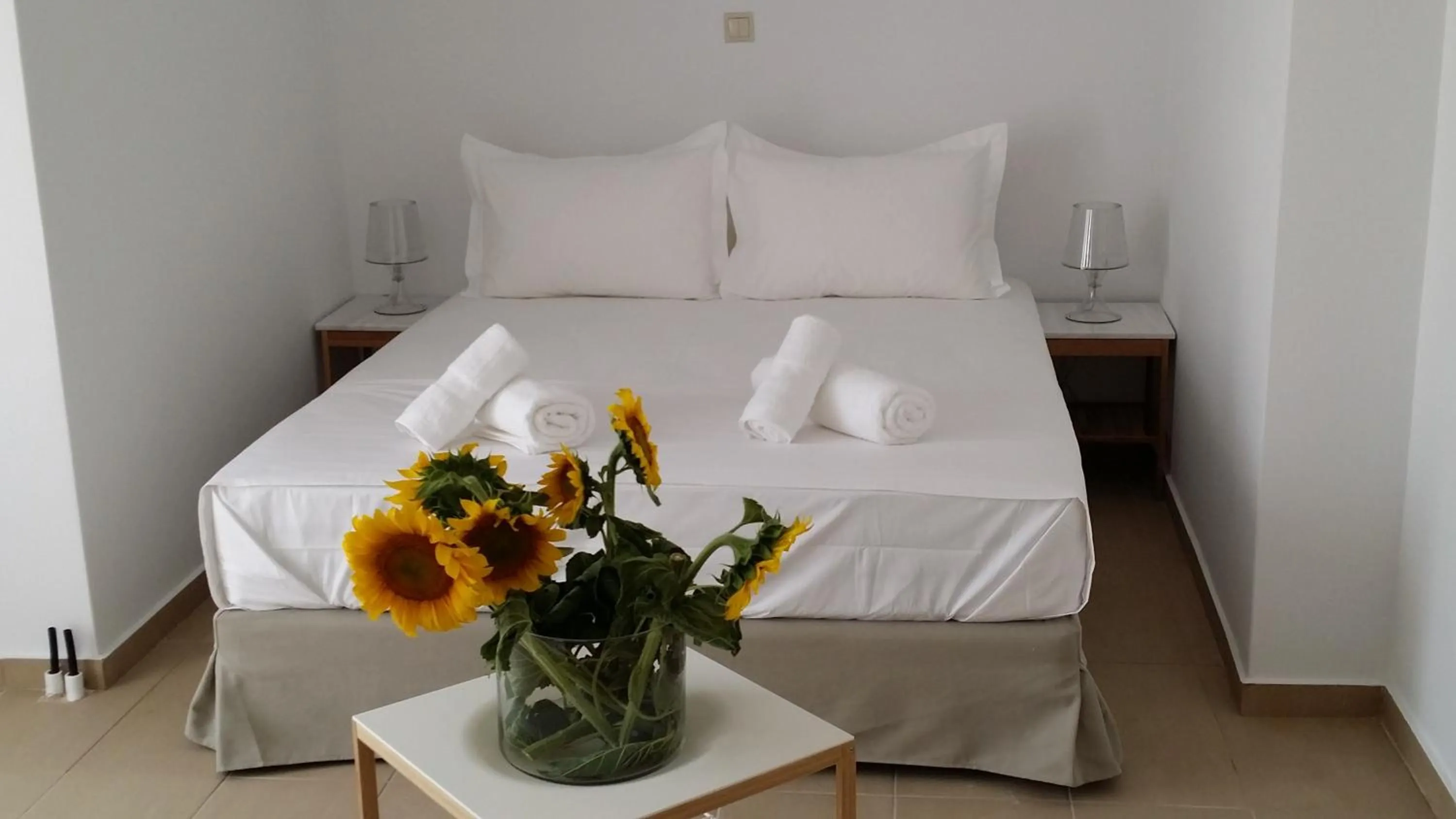 Bed in Niovi Boutique Apartments
