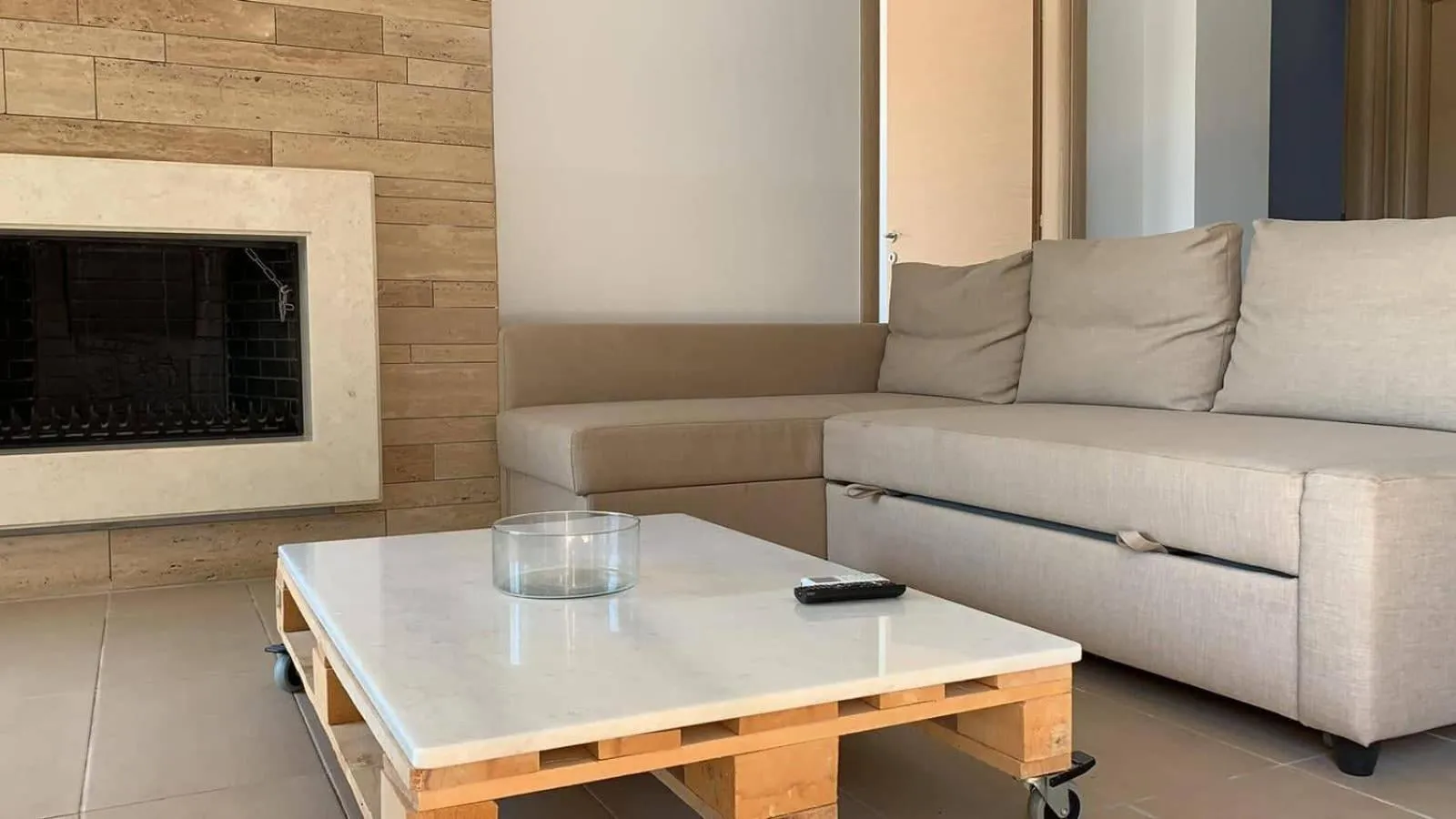 Communal lounge/ TV room in Niovi Boutique Apartments