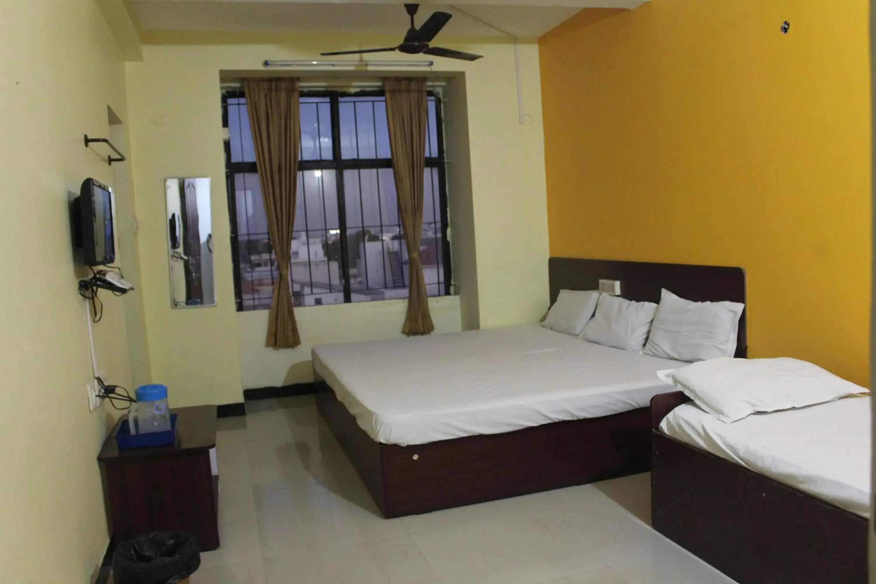 Economy Quadruple Room in Aishvarya Residency Economy Quadruple Room in Aishvarya Residency