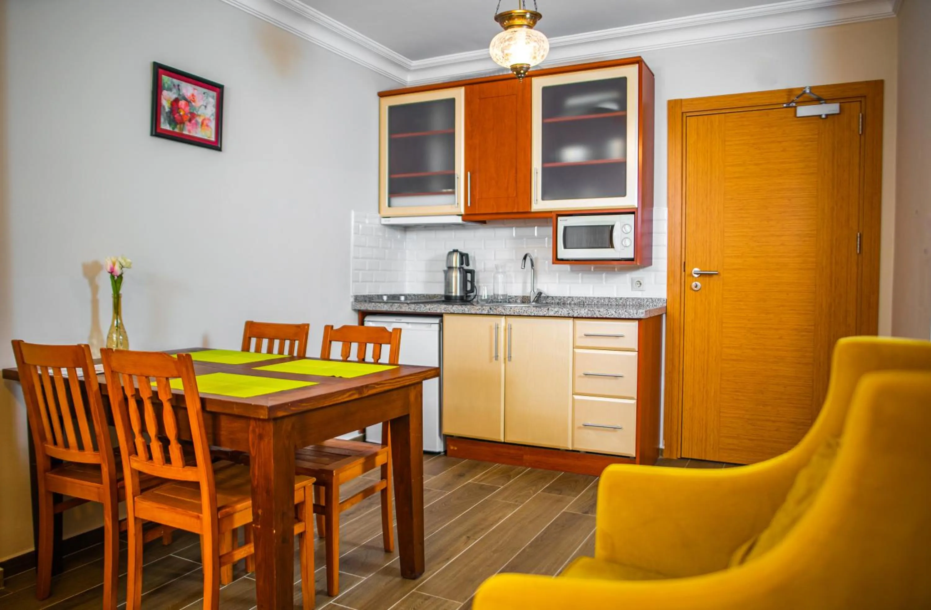 Kitchen or kitchenette in Dores Residence