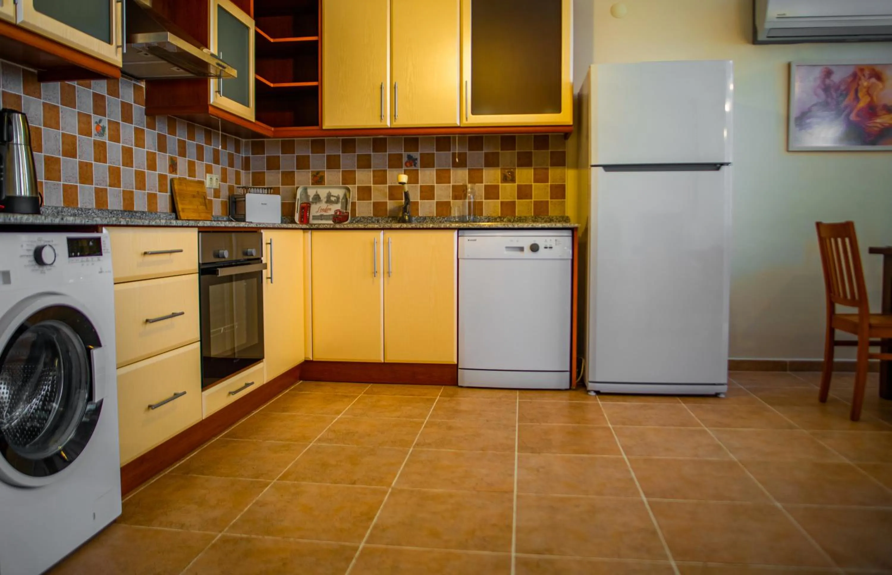 Kitchen or kitchenette in Dores Residence