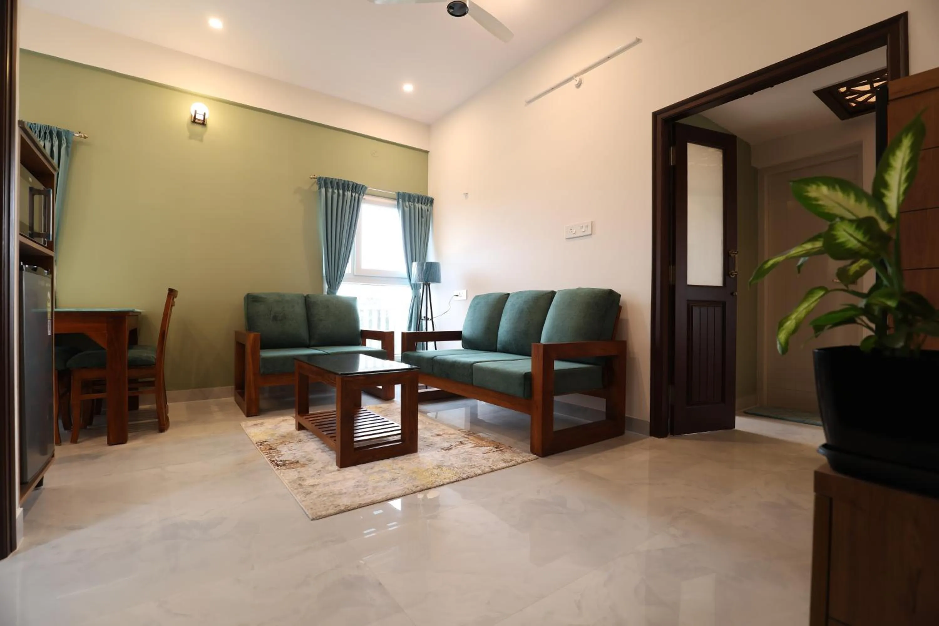 Living room in Olivette Suites