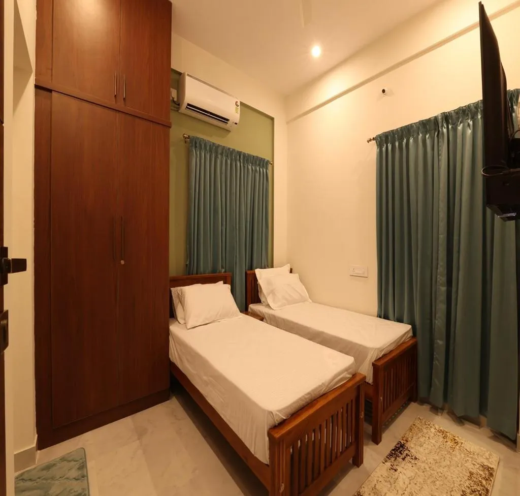 air conditioner, Bed in Olivette Suites