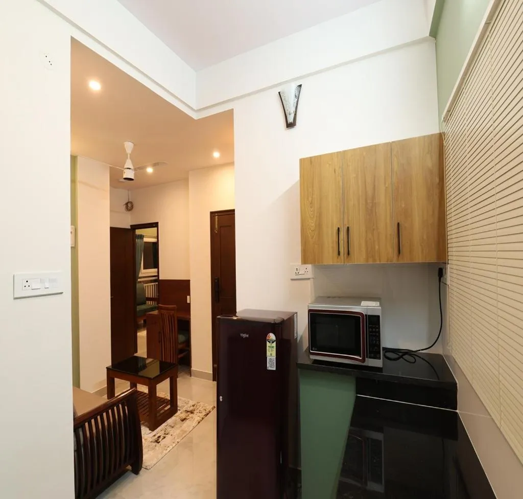 Kitchen or kitchenette in Olivette Suites