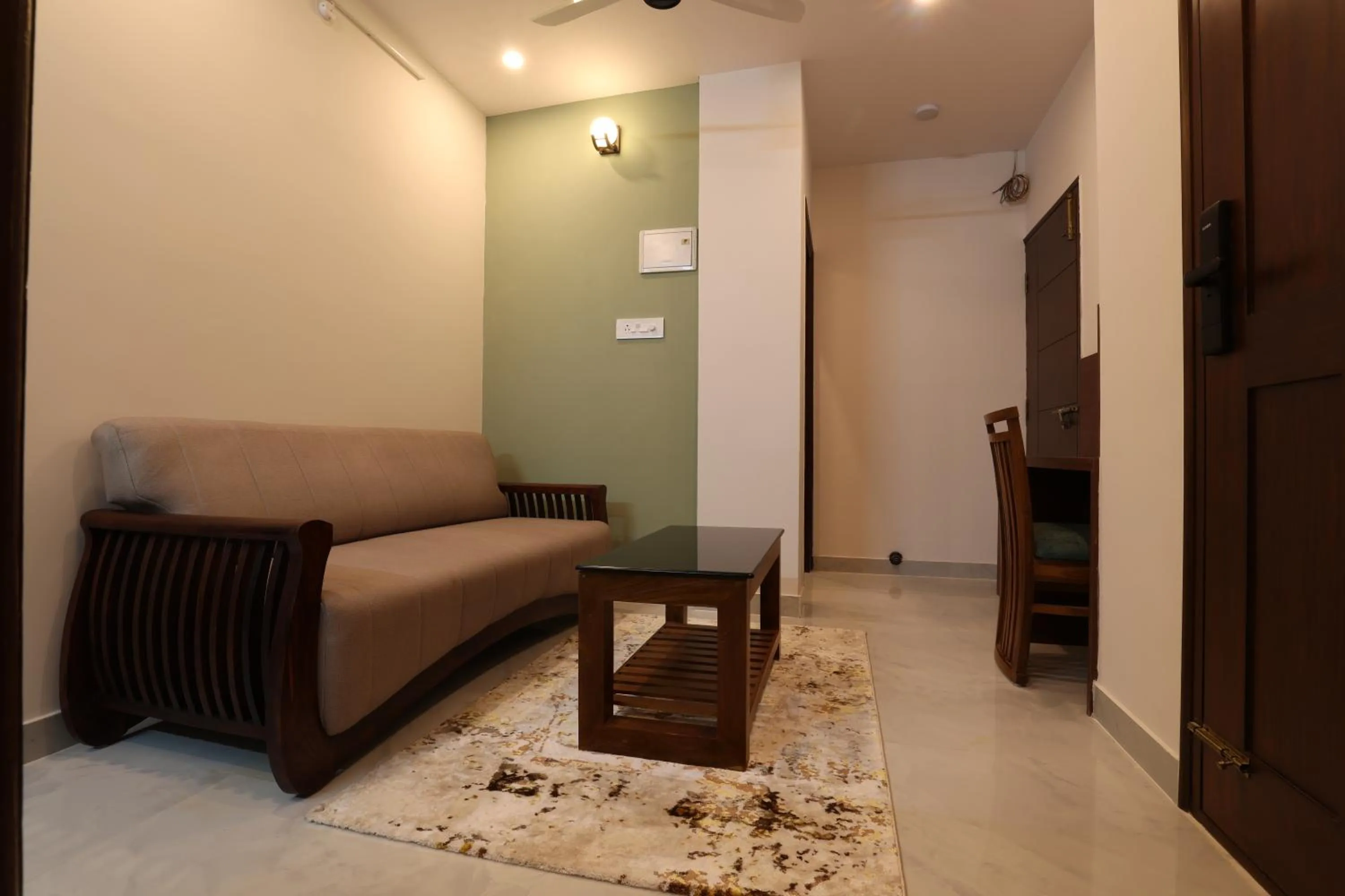 Living room in Olivette Suites