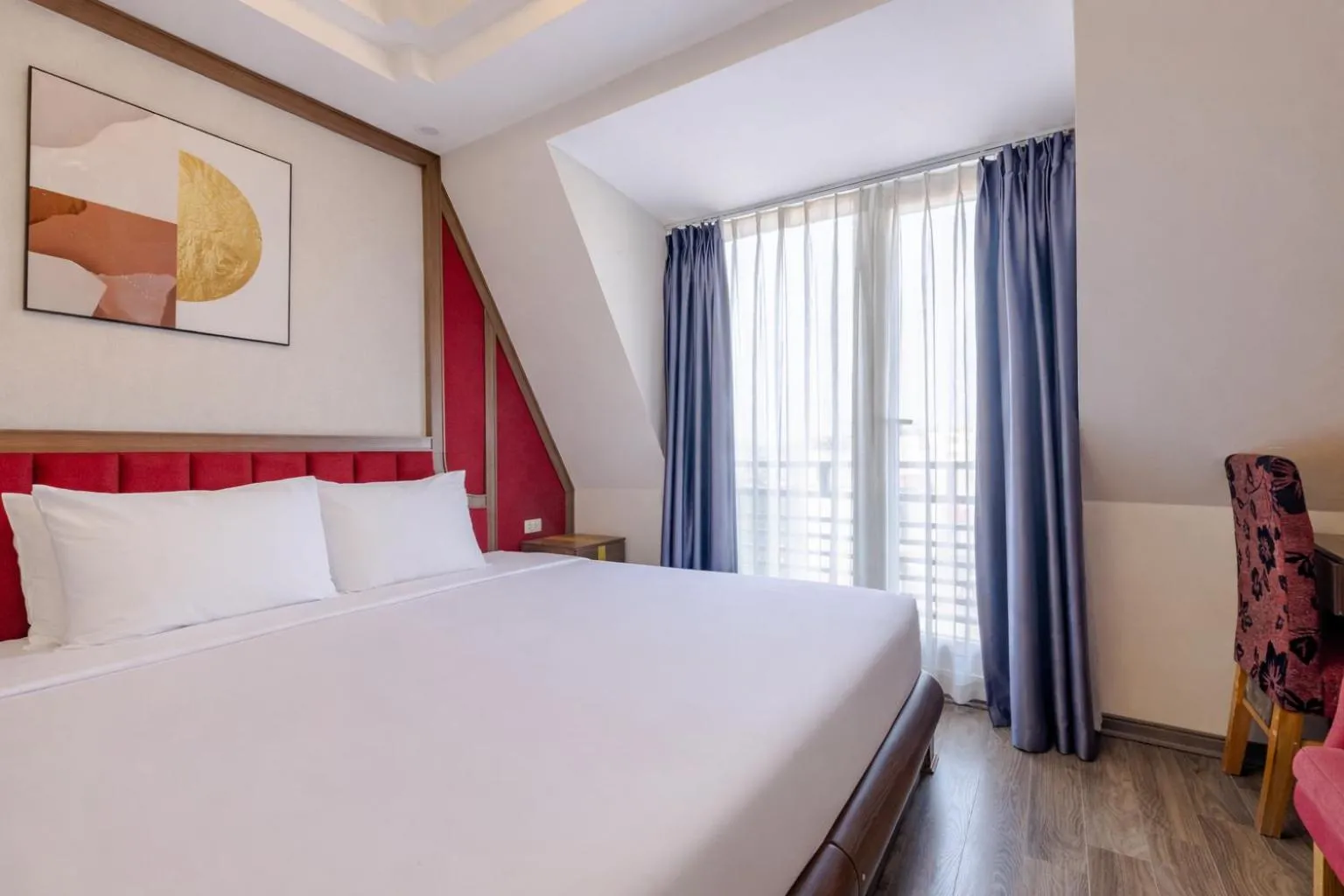 Quadruple Room with Balcony in Sky Charm Hanoi Hotel and Spa