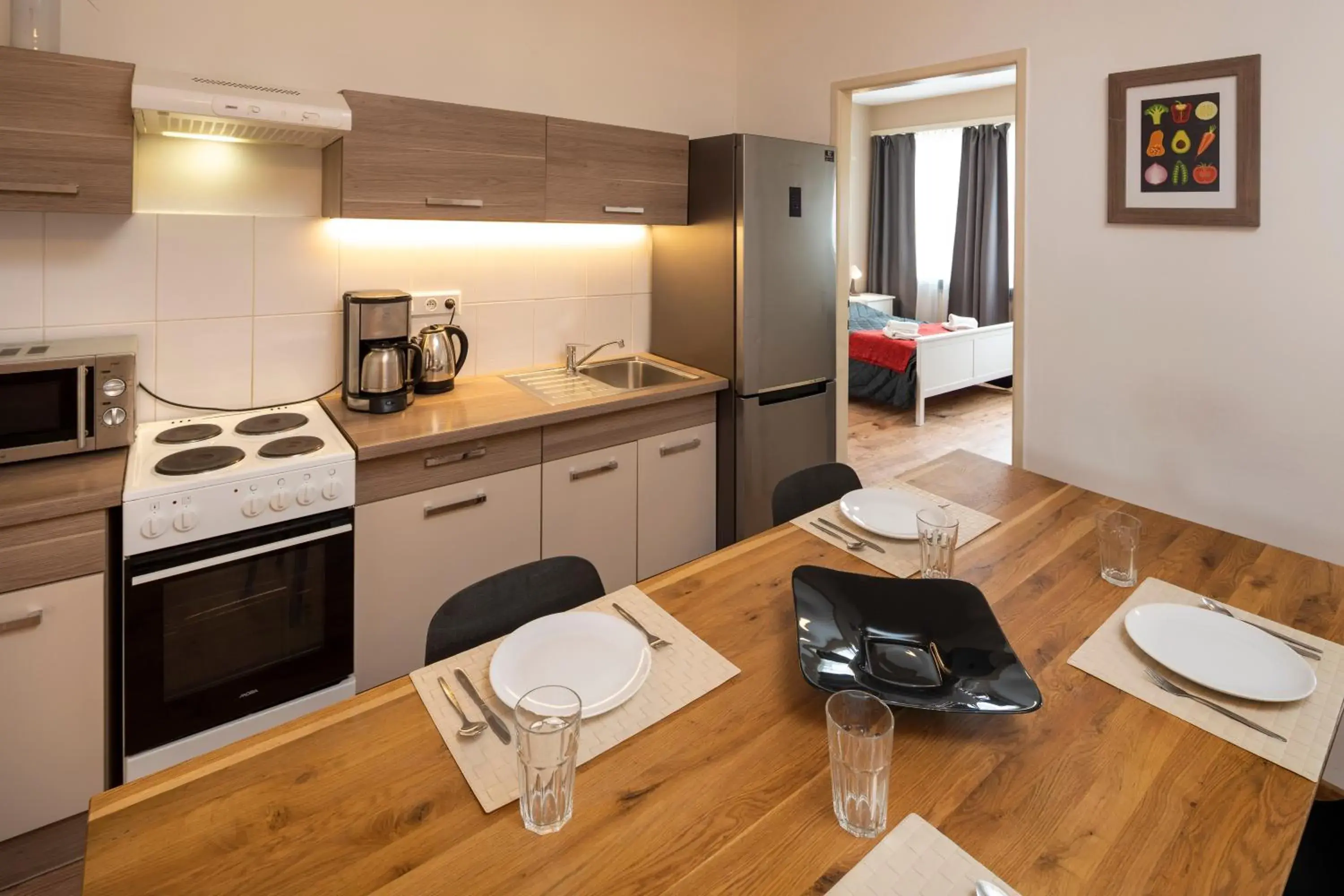 Living room, Kitchen/Kitchenette in New Town - Apple Apartments