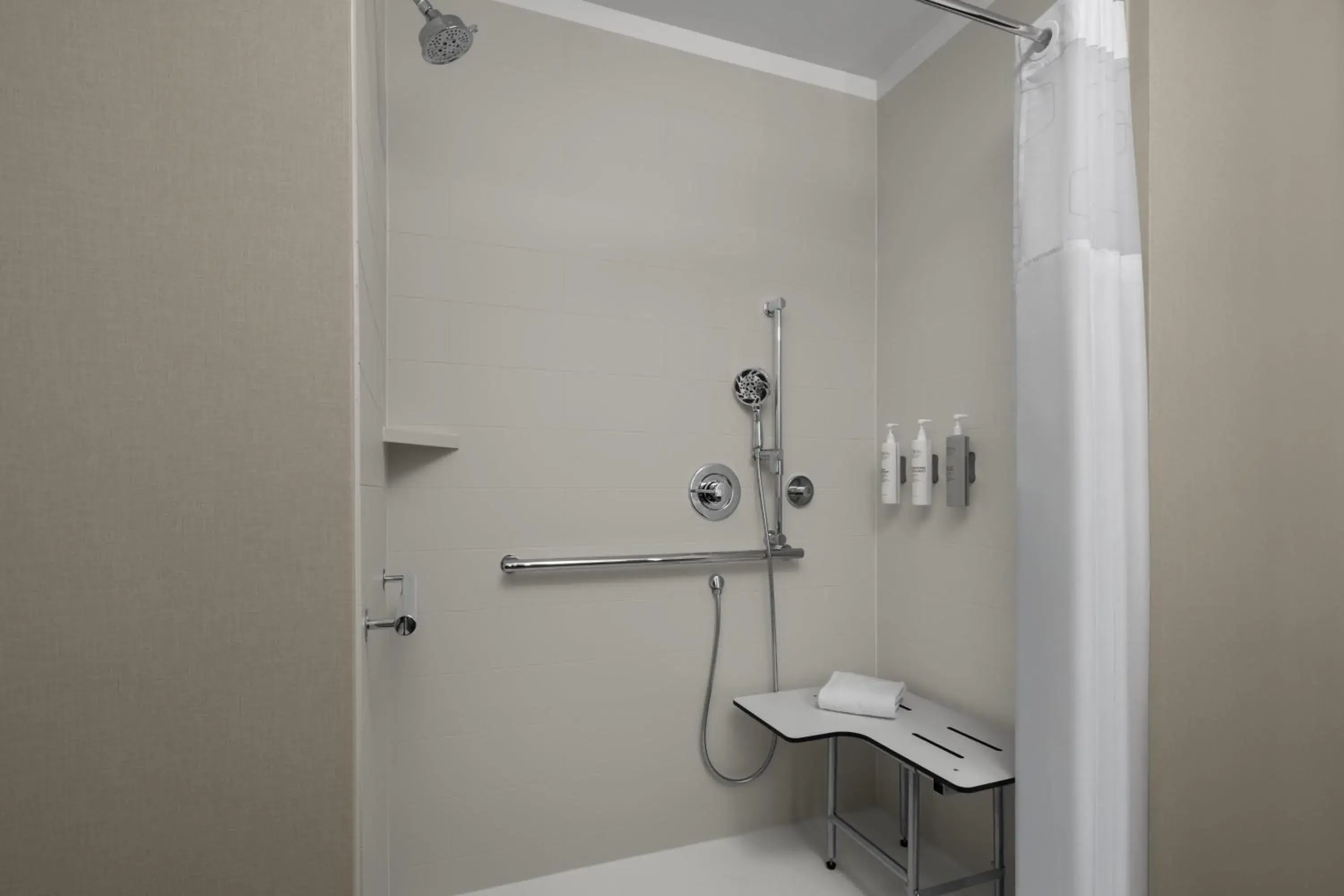 Bathroom in Hampton Inn & Suites By Hilton Long Island Farmingdale Bathroom in Hampton Inn & Suites By Hilton Long Island Farmingdale