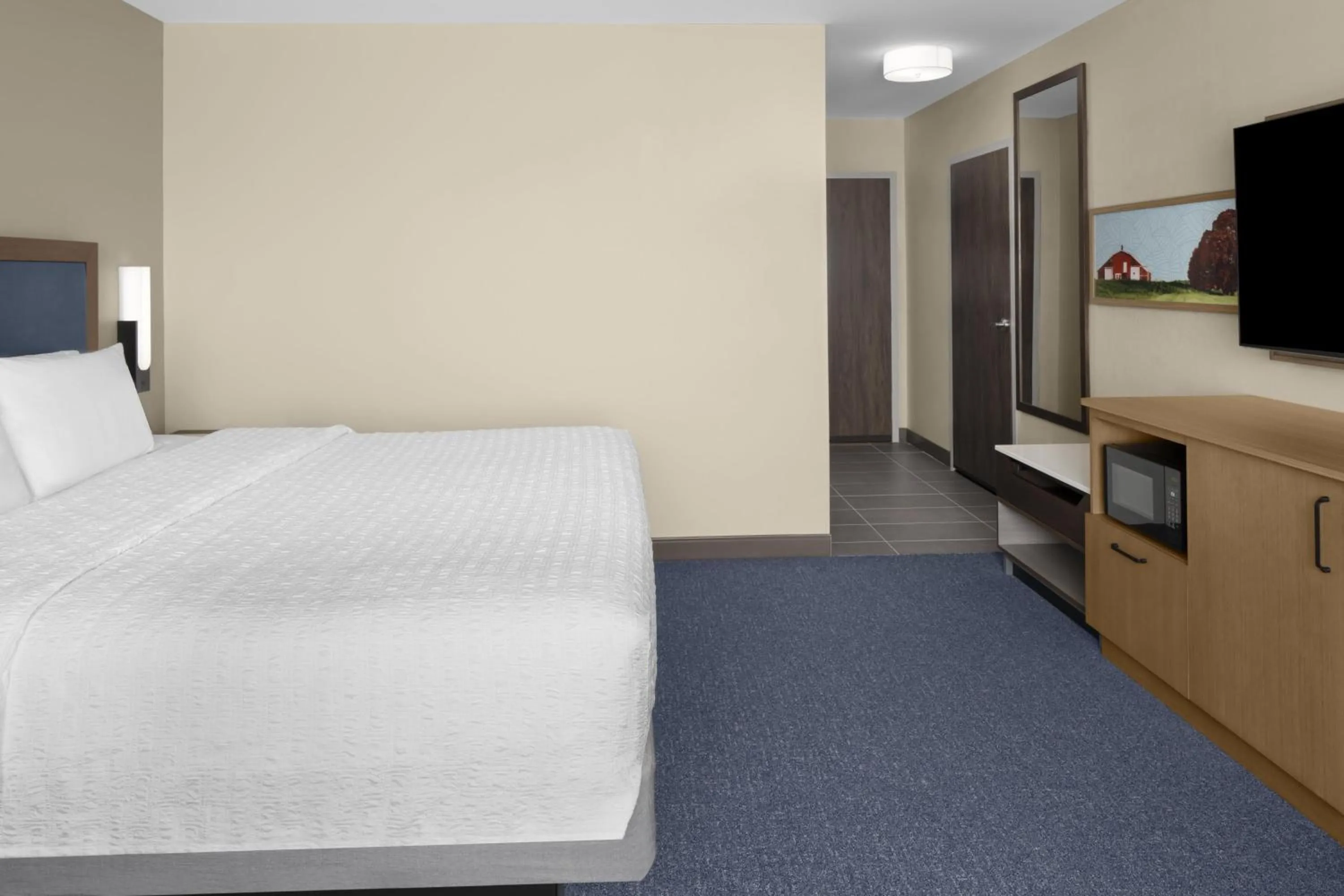 Bed in Hampton Inn & Suites By Hilton Long Island Farmingdale